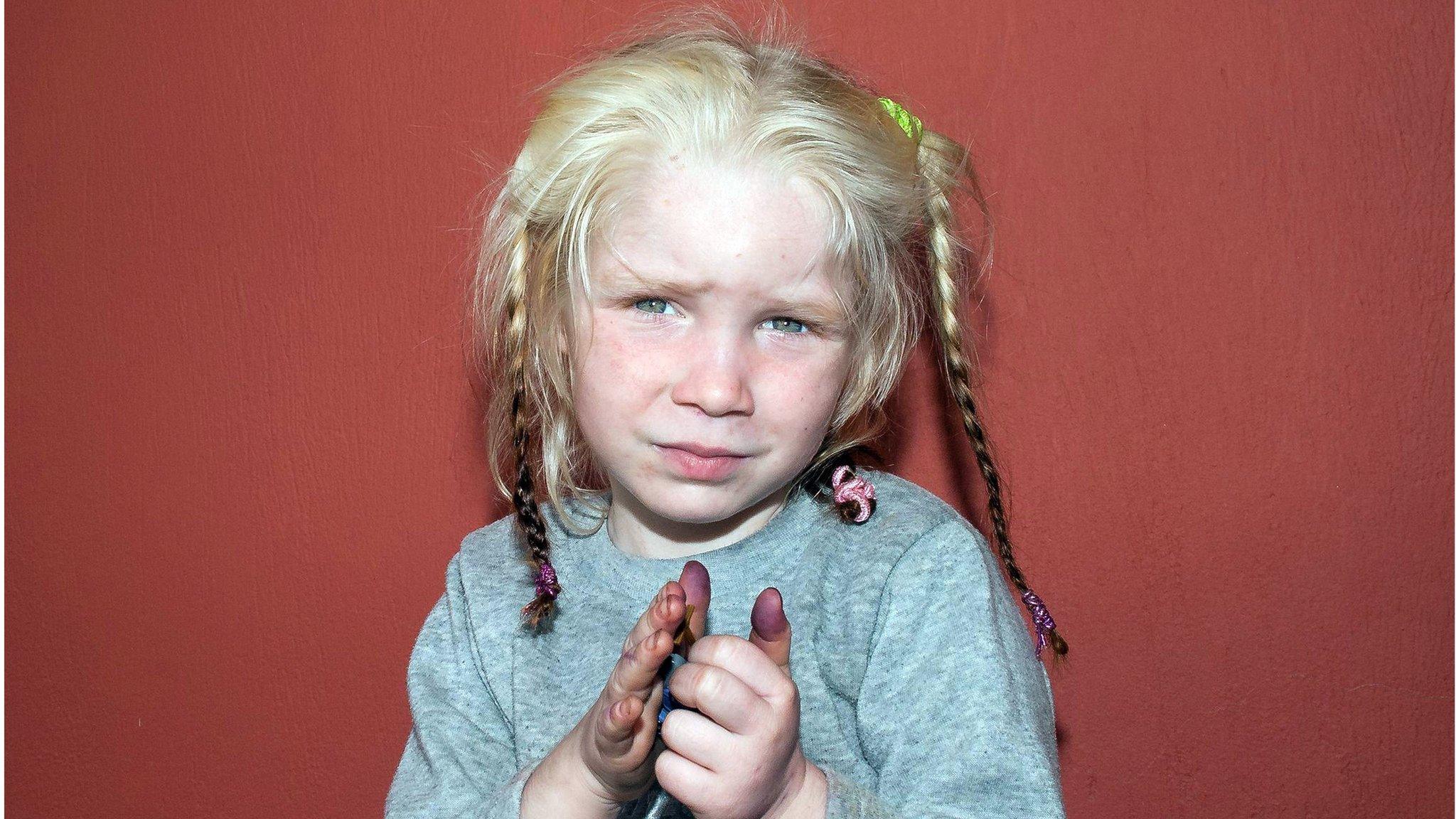 Handout photo released by Greek Police on October 18, 2013 shows an unidentified 4-year-old blonde girl whom was found on October 17, 2013 near Farsala in central Greece