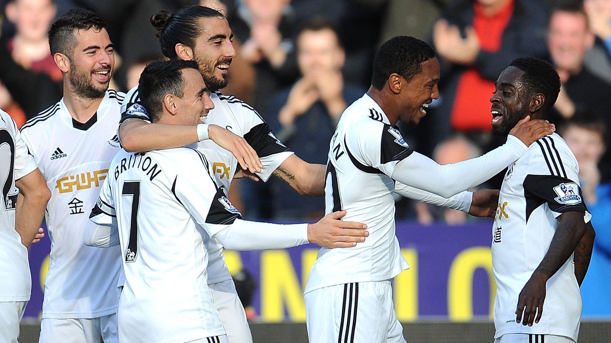 Swansea celebrate during the win over Sunderland