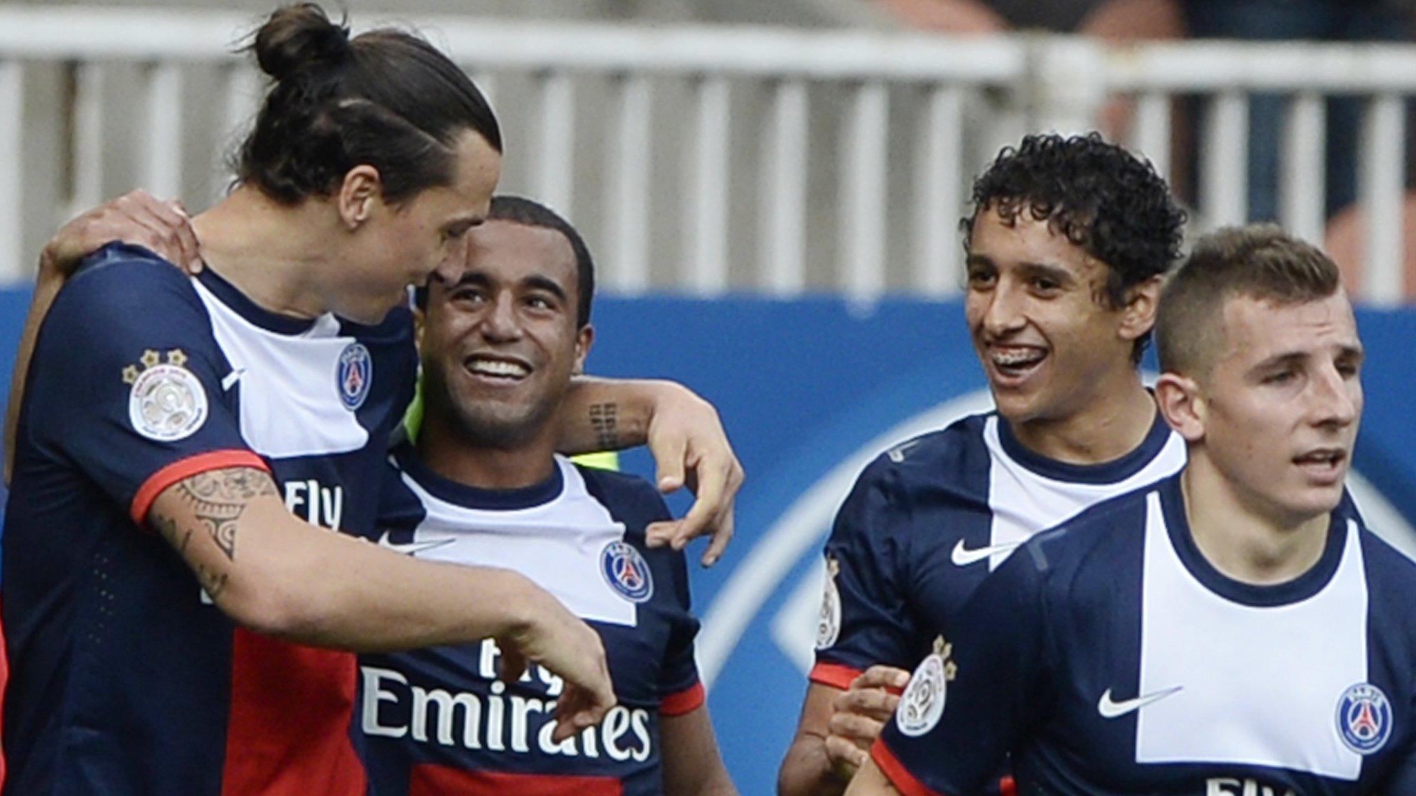 Paris Saint-Germain players celebrate after scoring against Bastia