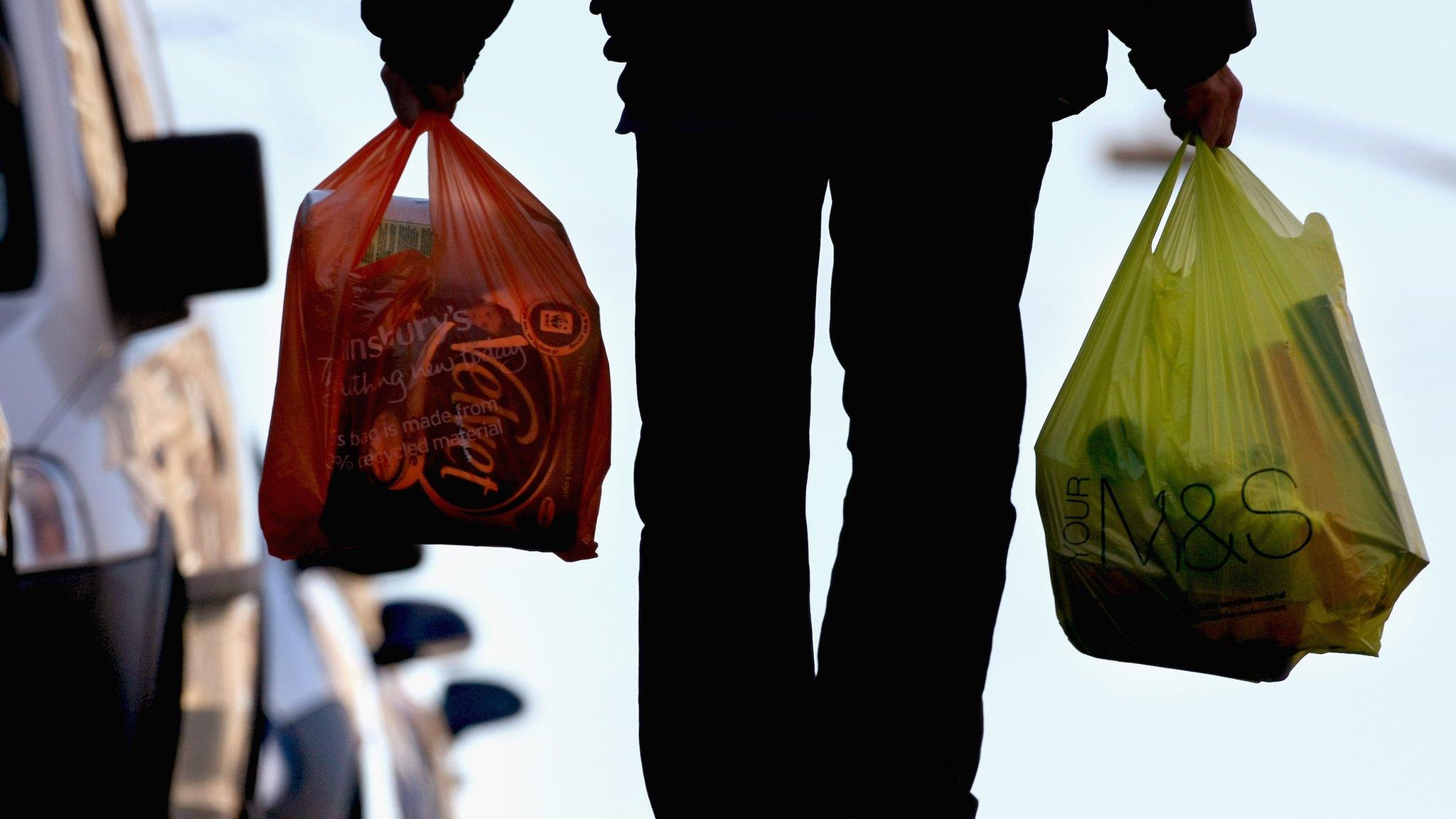 Shopping bags being carried