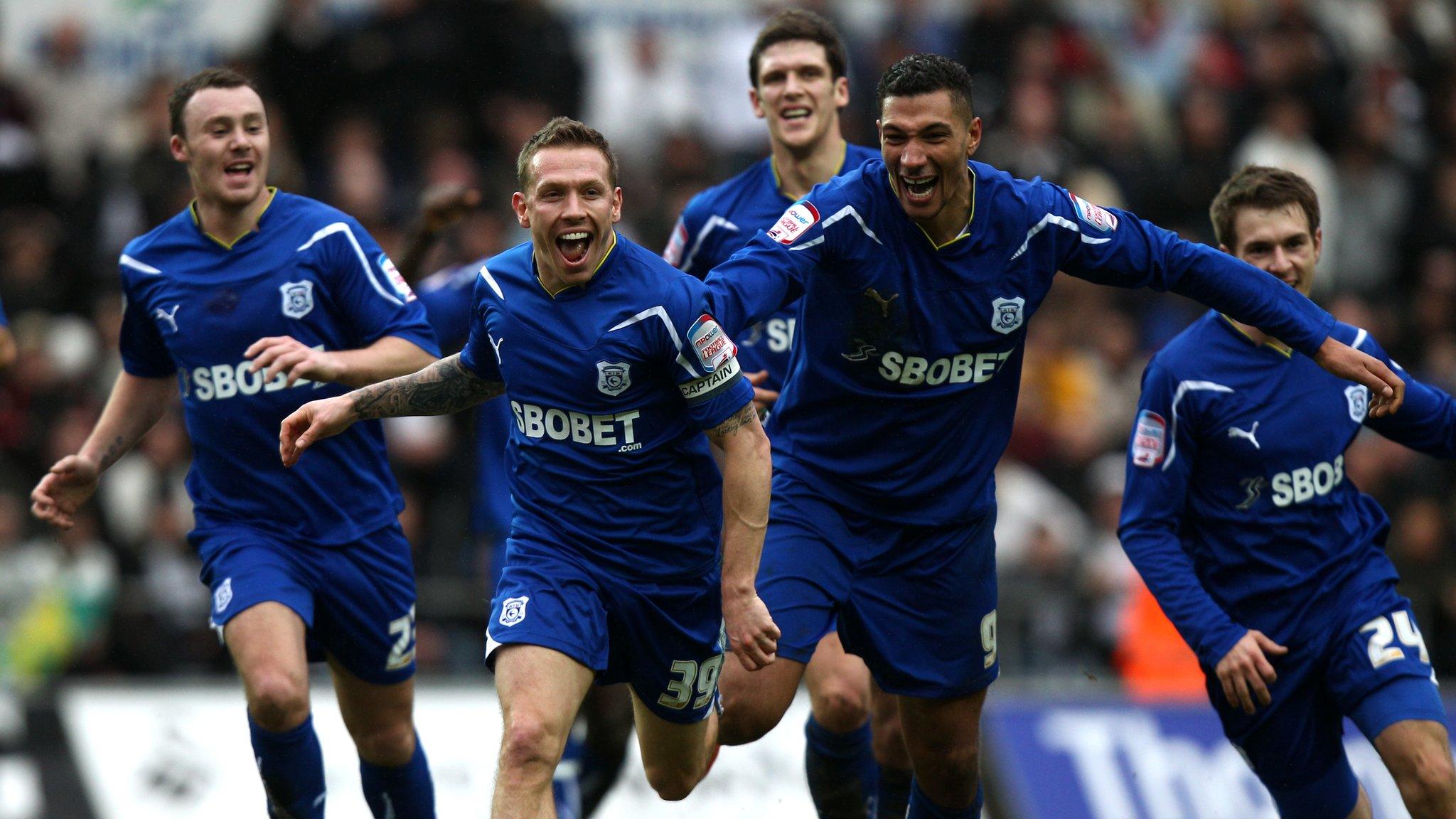 Craig Bellamy and team-mates celebrate