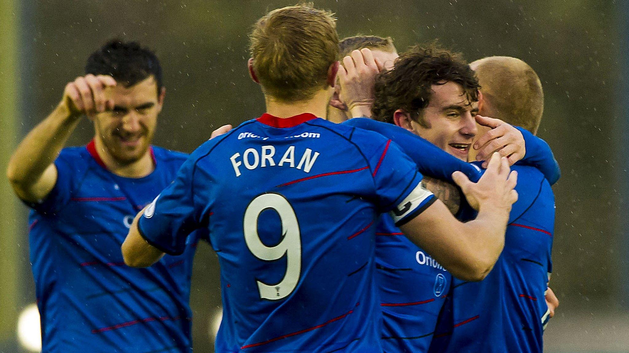 Inverness players celebrating