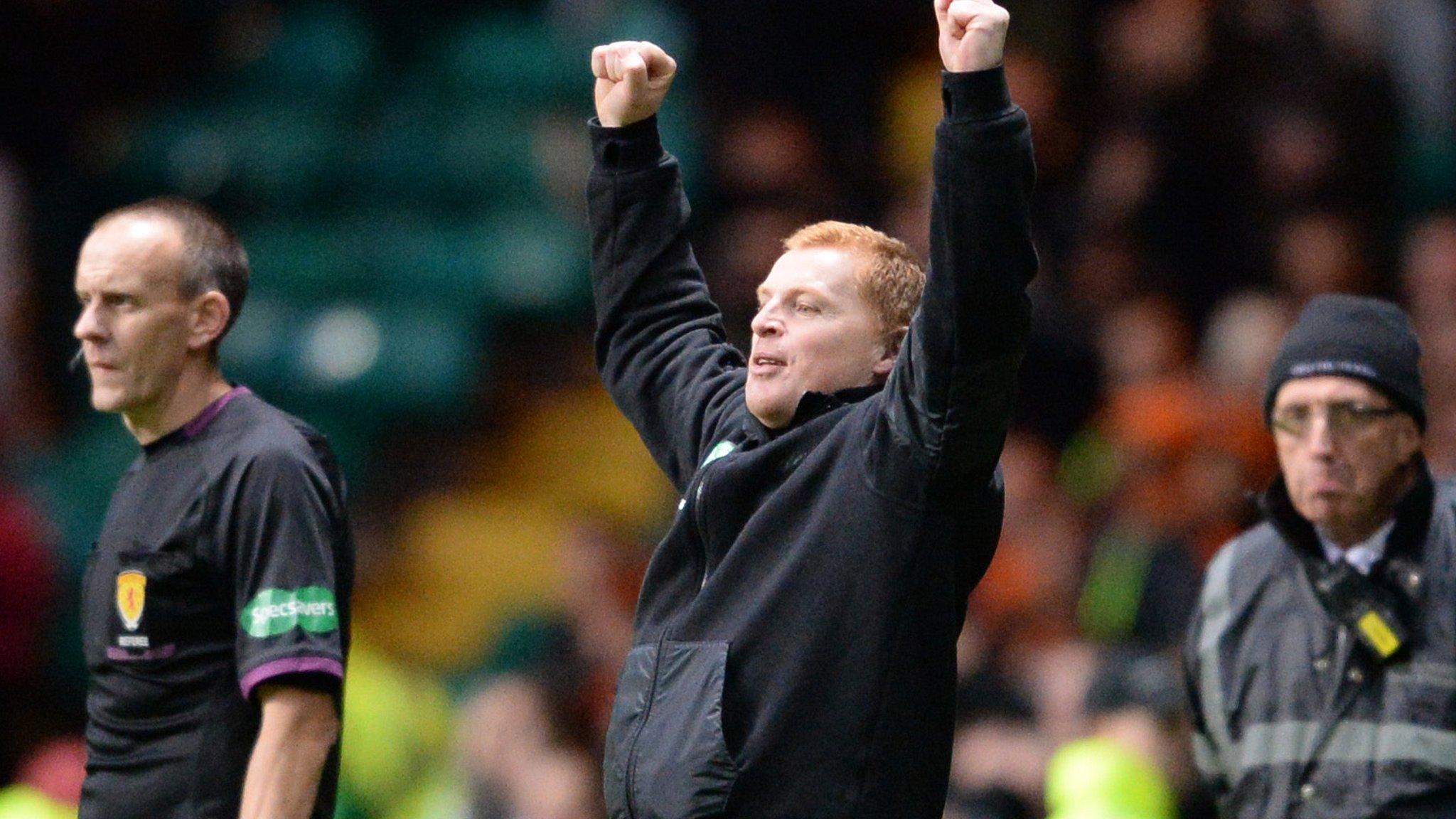 Celtic manager Neil Lennon salutes Charlie Mulgrew's equaliser against Dundee United