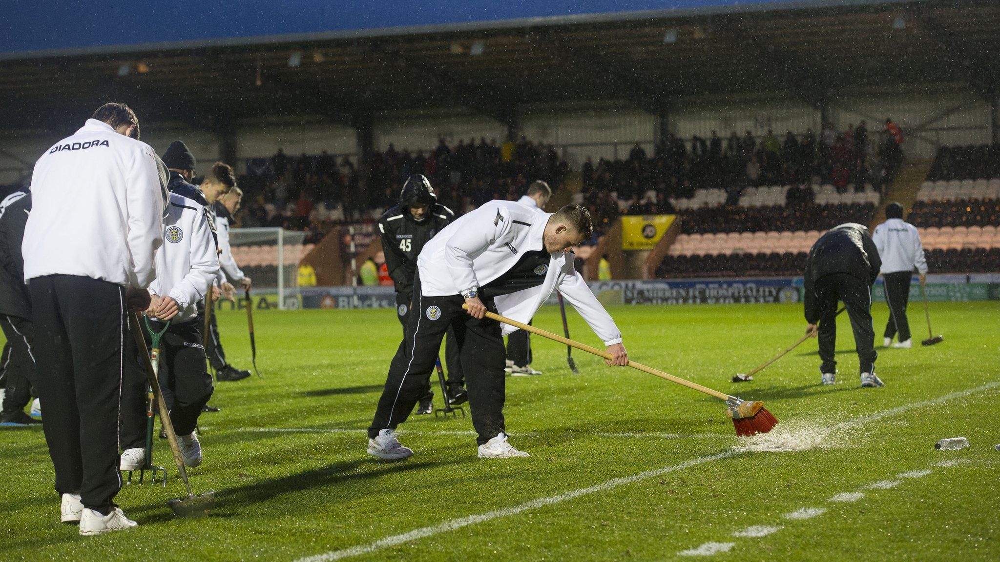 The wet pitch at St Mirren Park