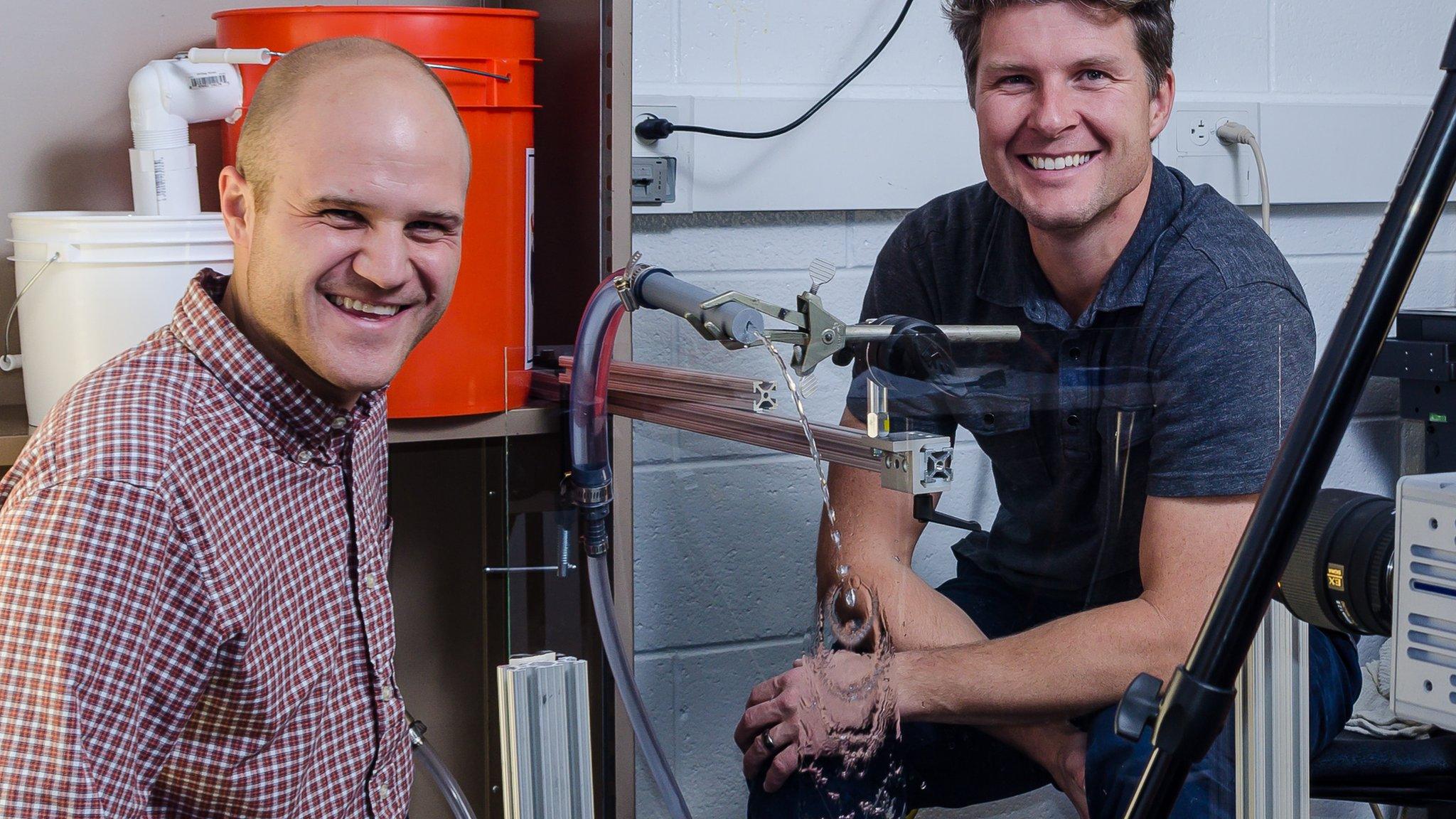 Randy Hurd and Tadd Truscott with their urination simulator