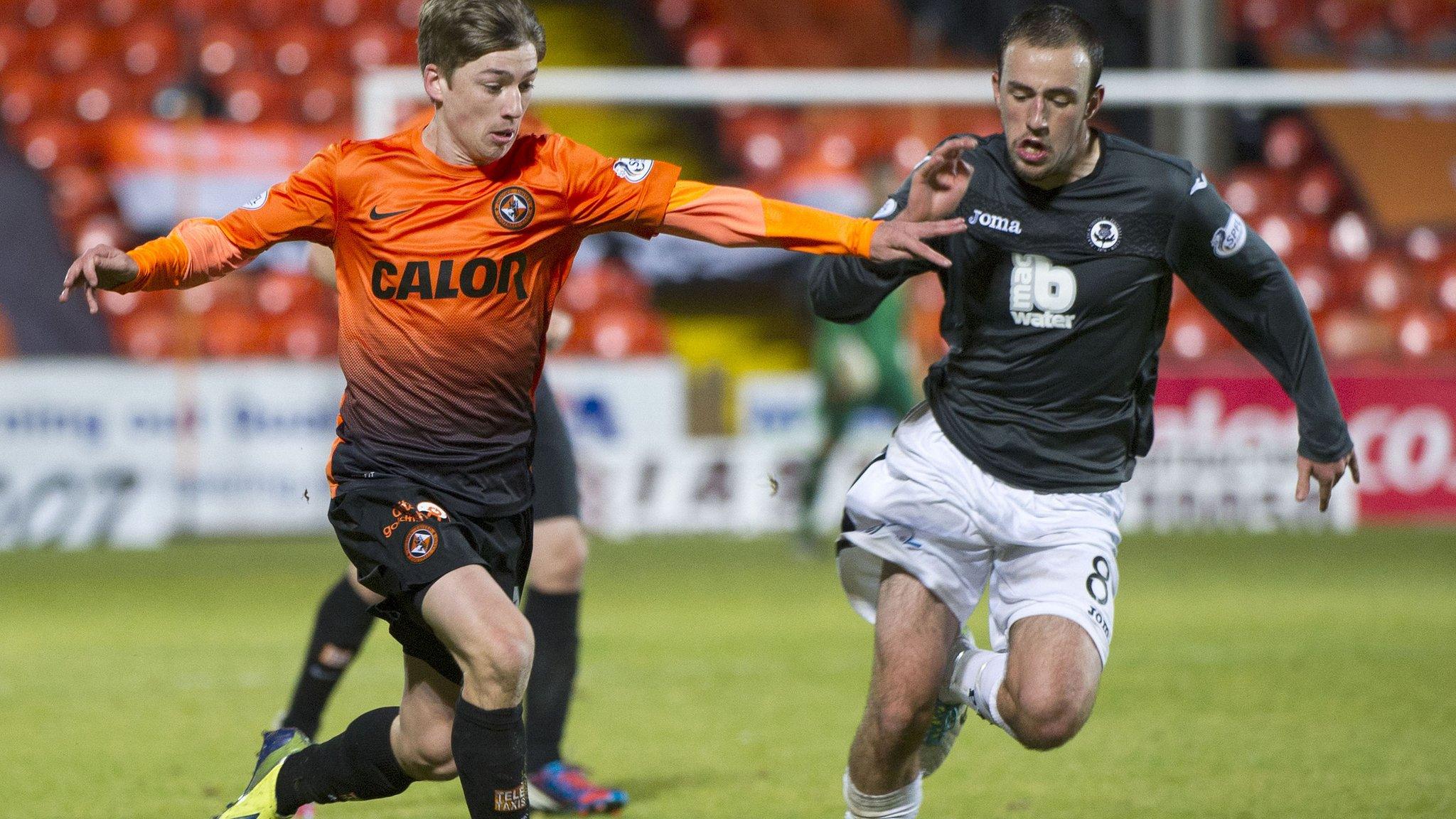 Dundee United's Ryan Gauld and Partick Thistle's Stuart Bannigan