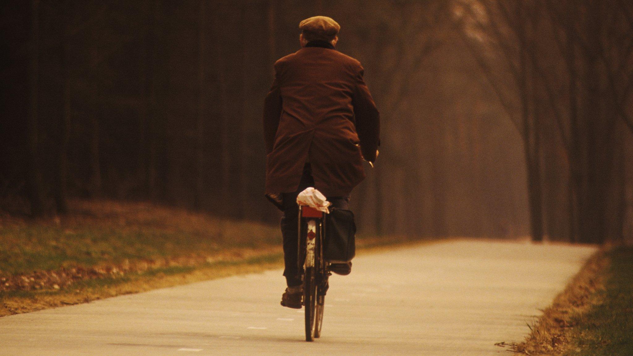 Elderly gentleman cycling