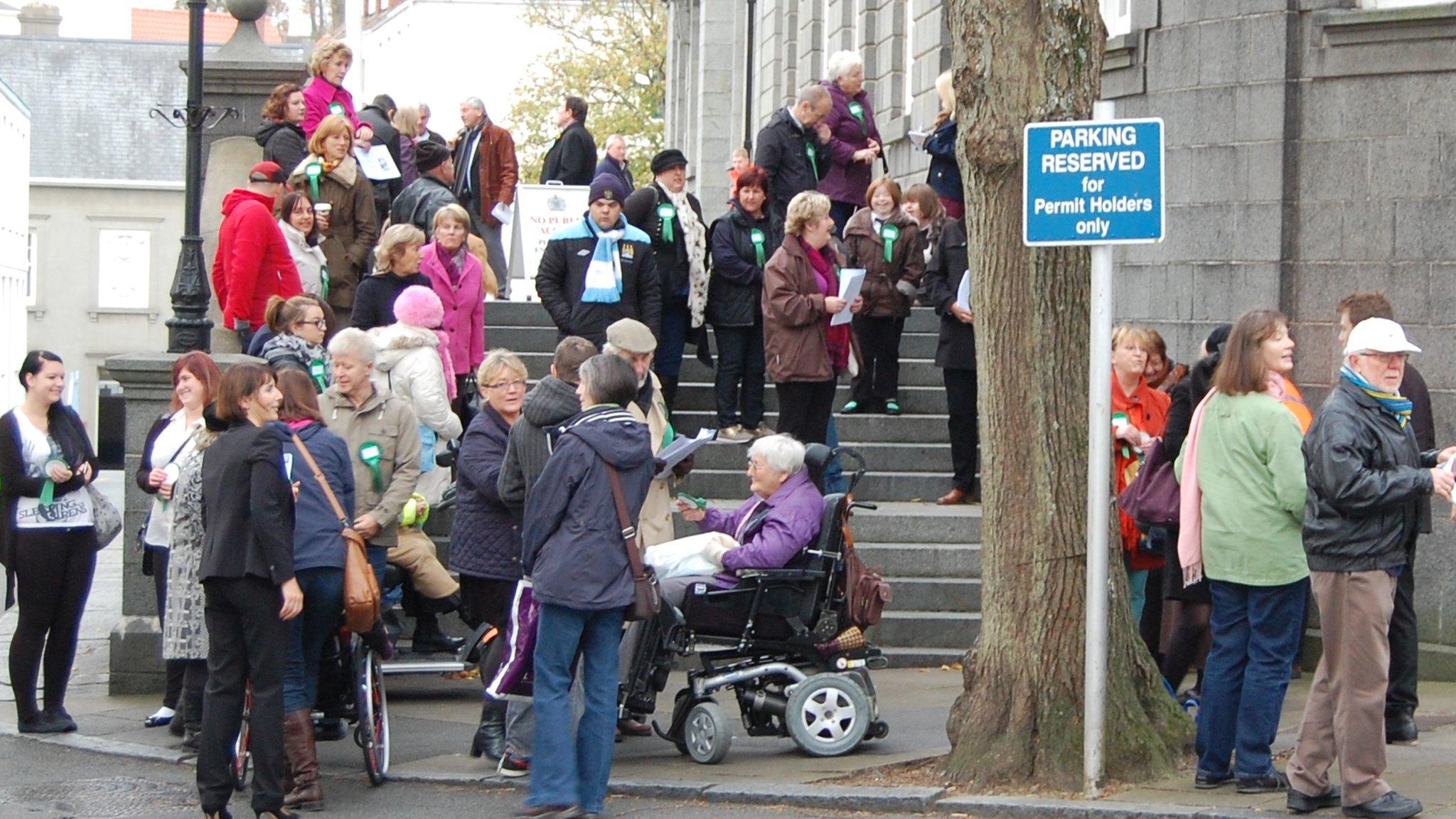 Campaigners outside Guernsey's Royal Court building