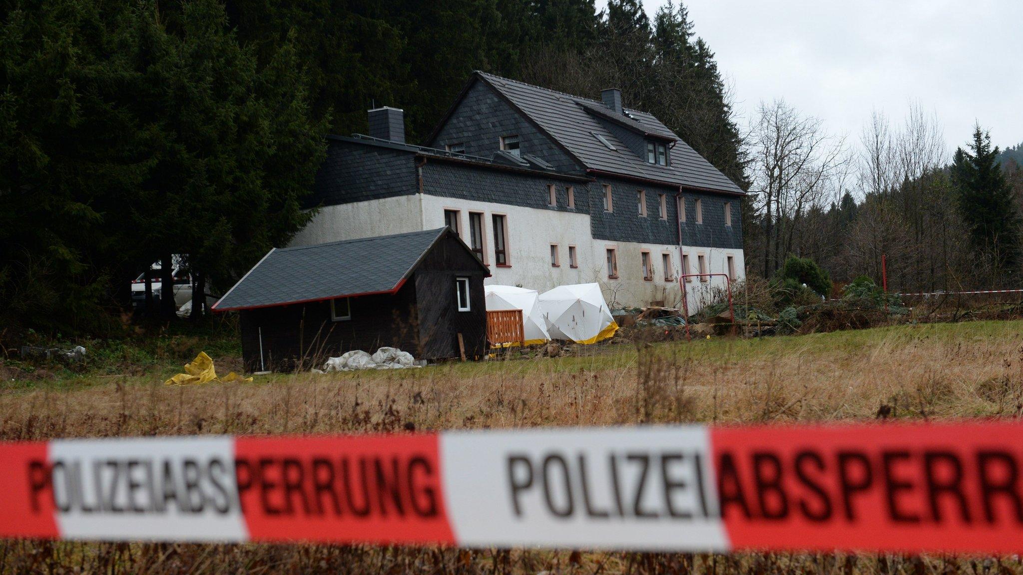 Police cordons block a property near Reichenau, eastern Germany Friday Nov. 29, 2013