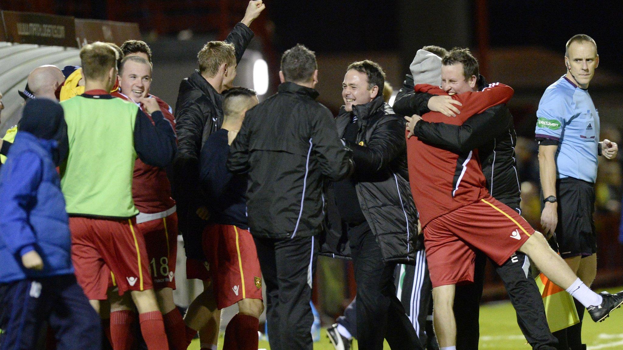 The Albion Rovers bench celebrates