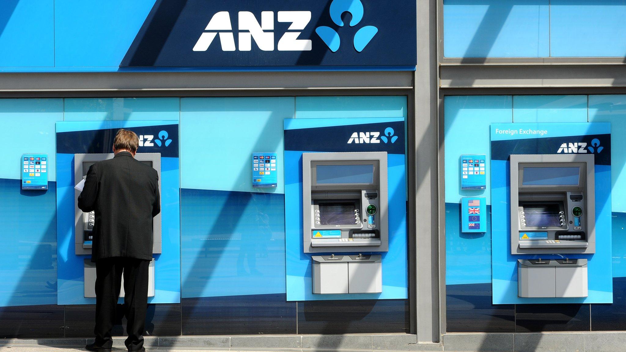 A customer using an ANZ ATM