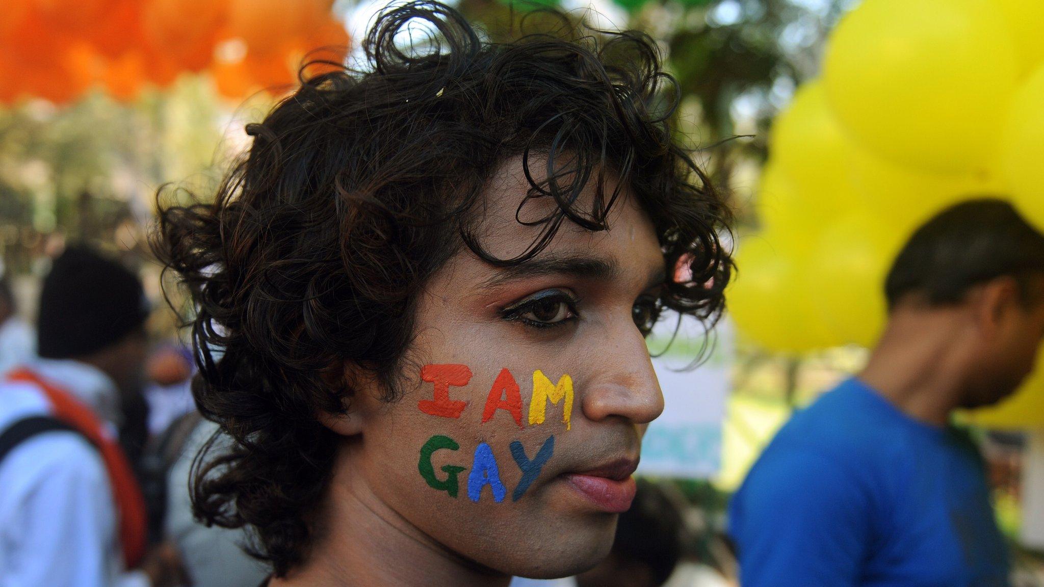 A participant at a gay pride rally in India