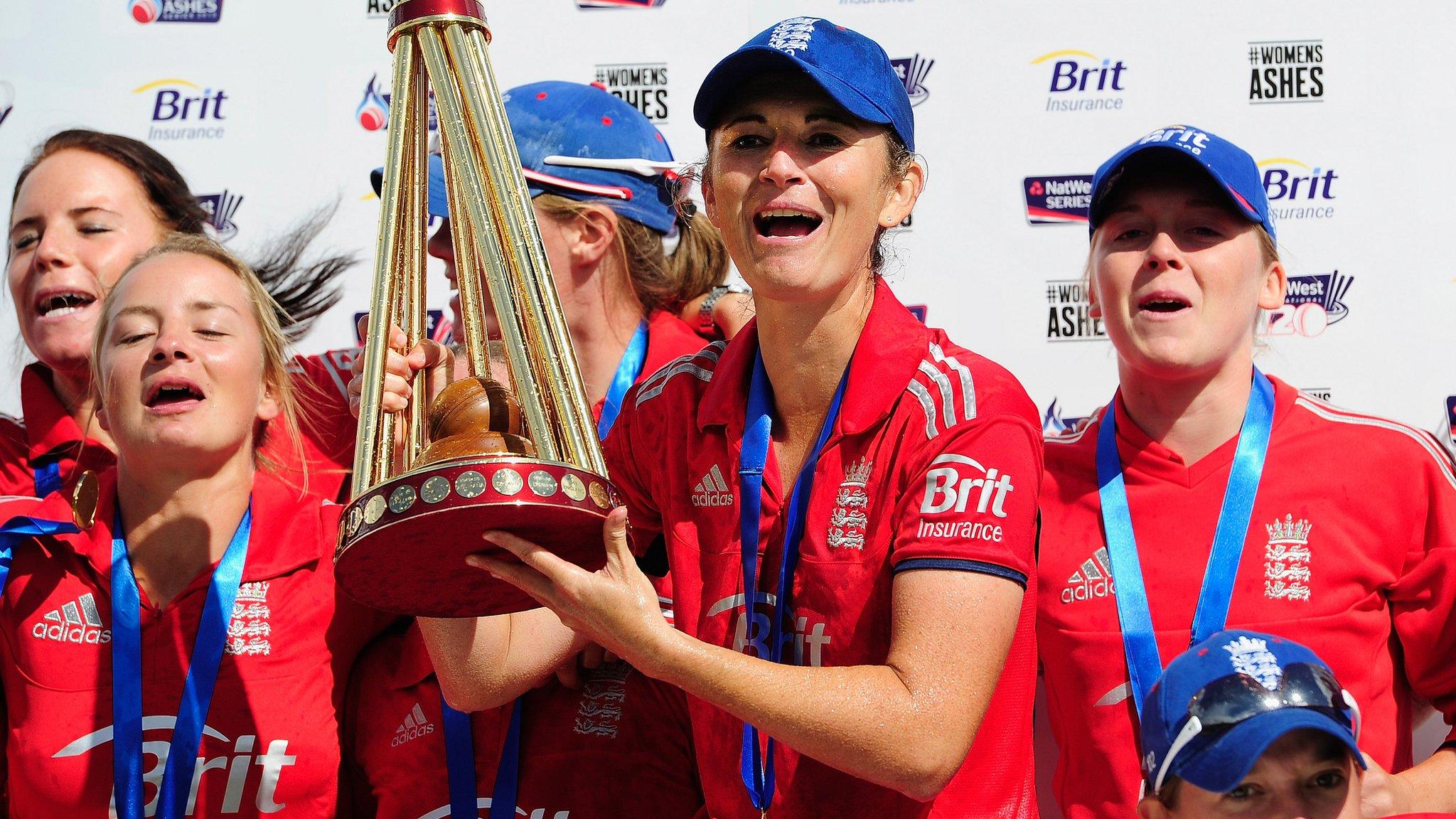 England captain Charlotte Edwards lifts the Ashes trophy in 2013