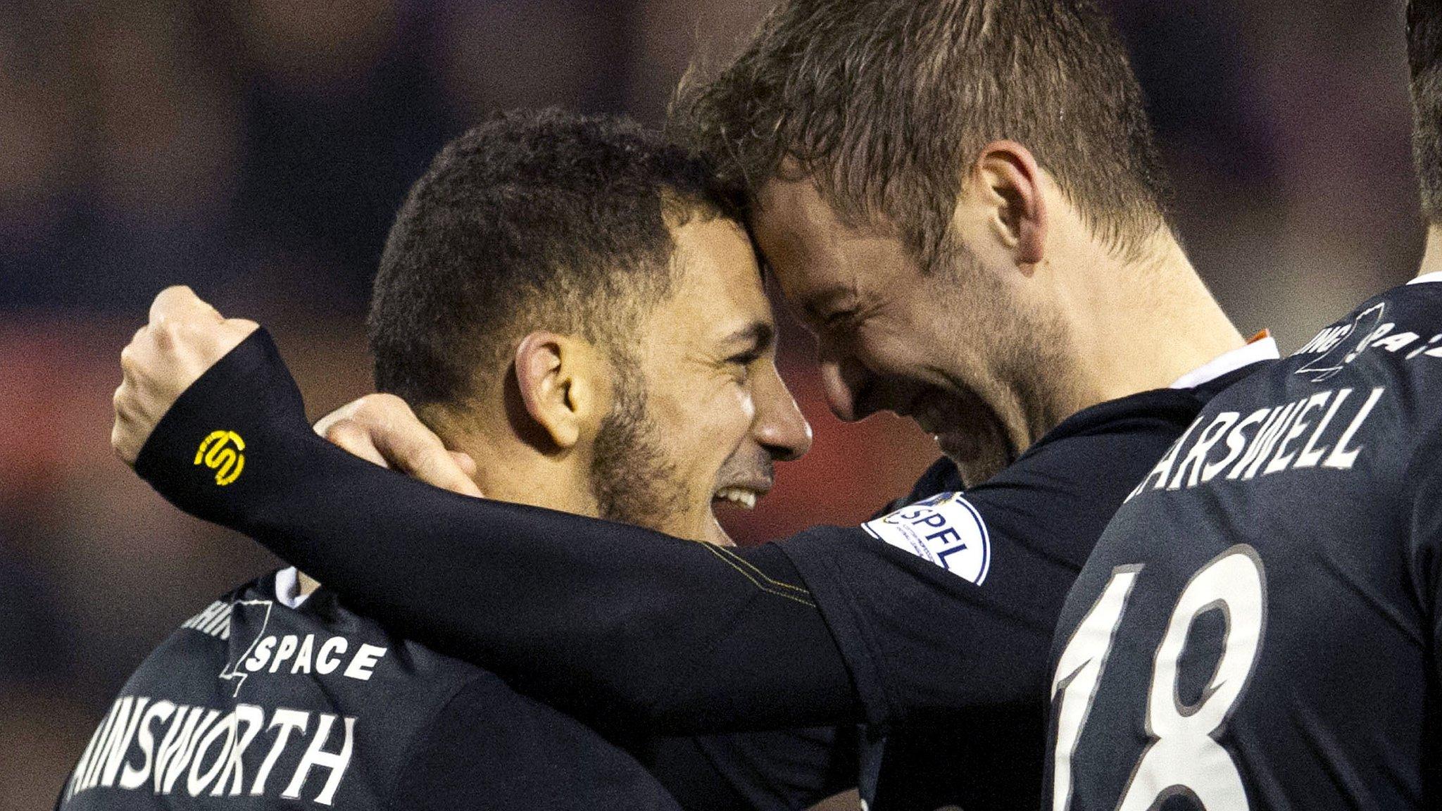 Lionel Ainsworth celebrates