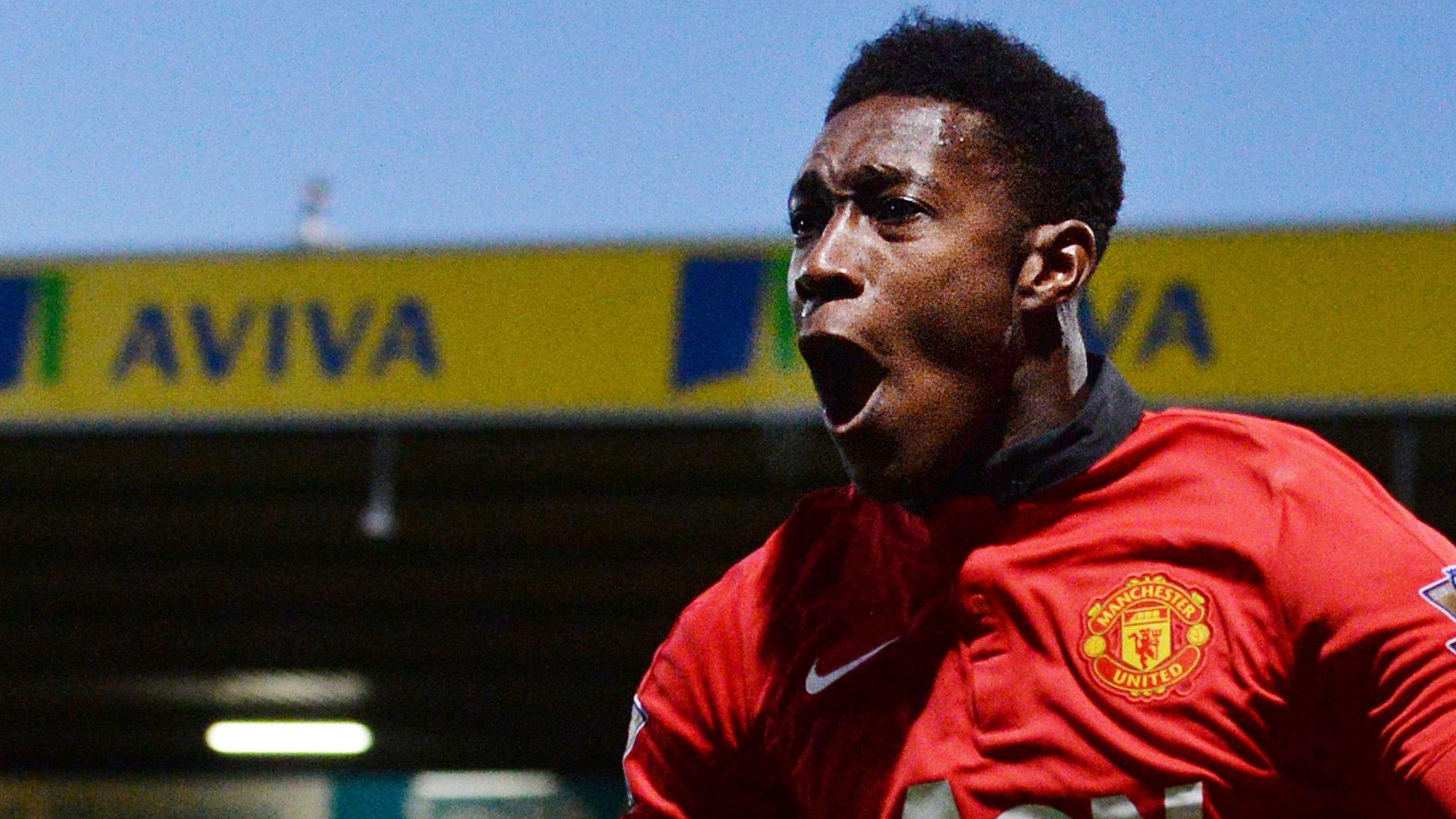 Manchester United striker Danny Welbeck (second right) celebrates his winner at Norwich