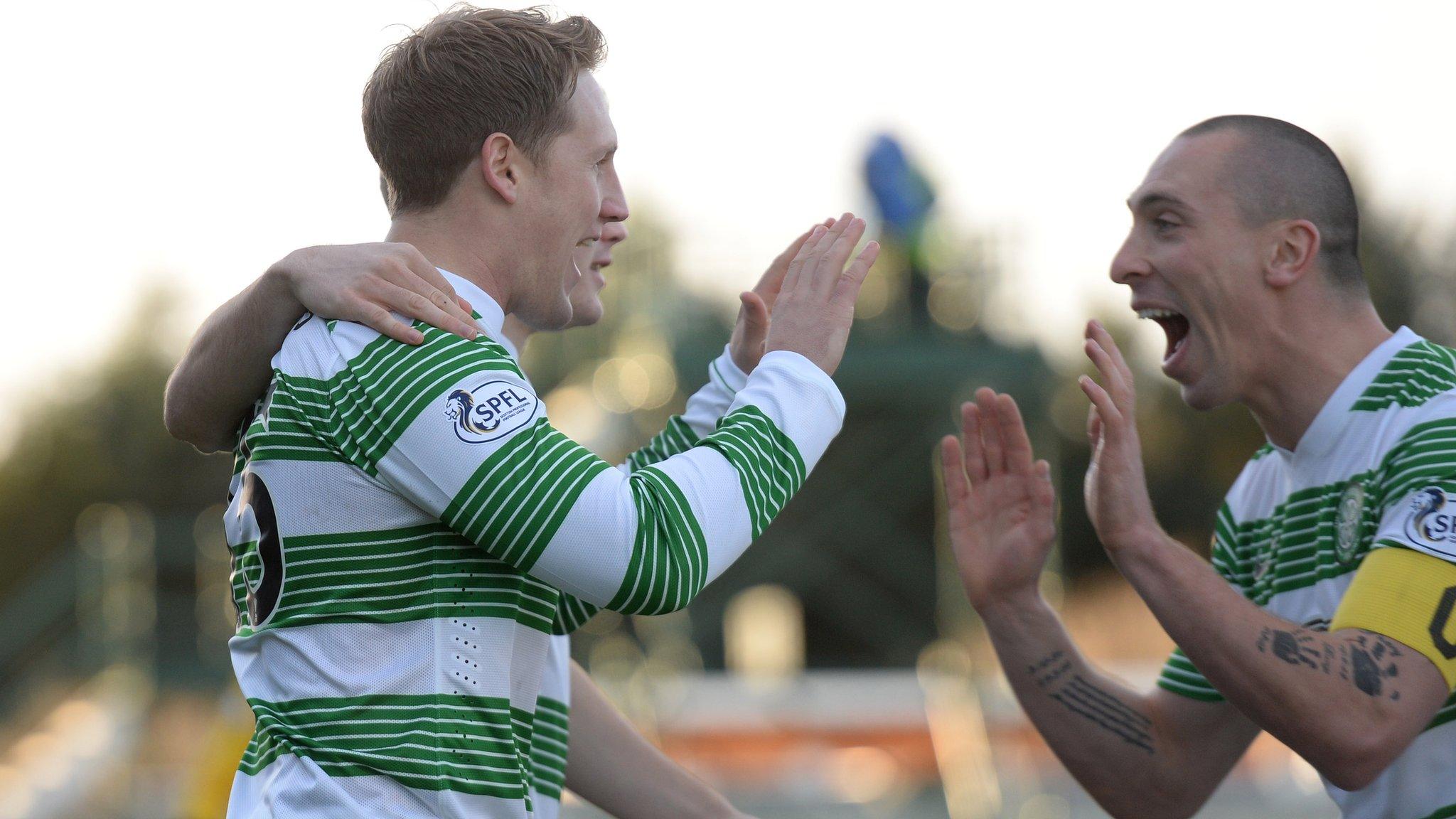 Kris Commons celebrates with Scott Brown