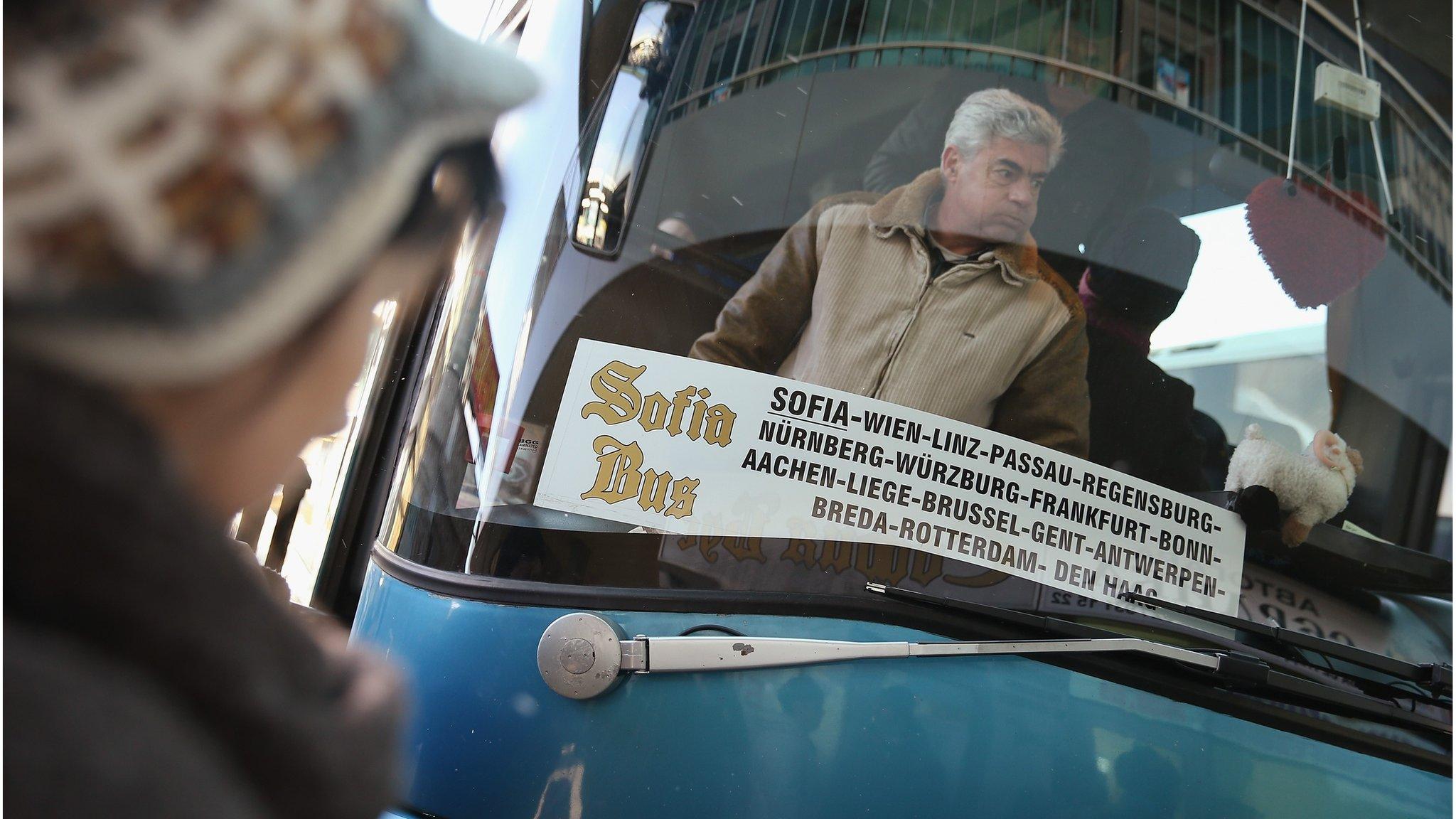 People prepare to board buses going abroad at the main bus station on December 7, 2013 in Sofia, Bulgaria