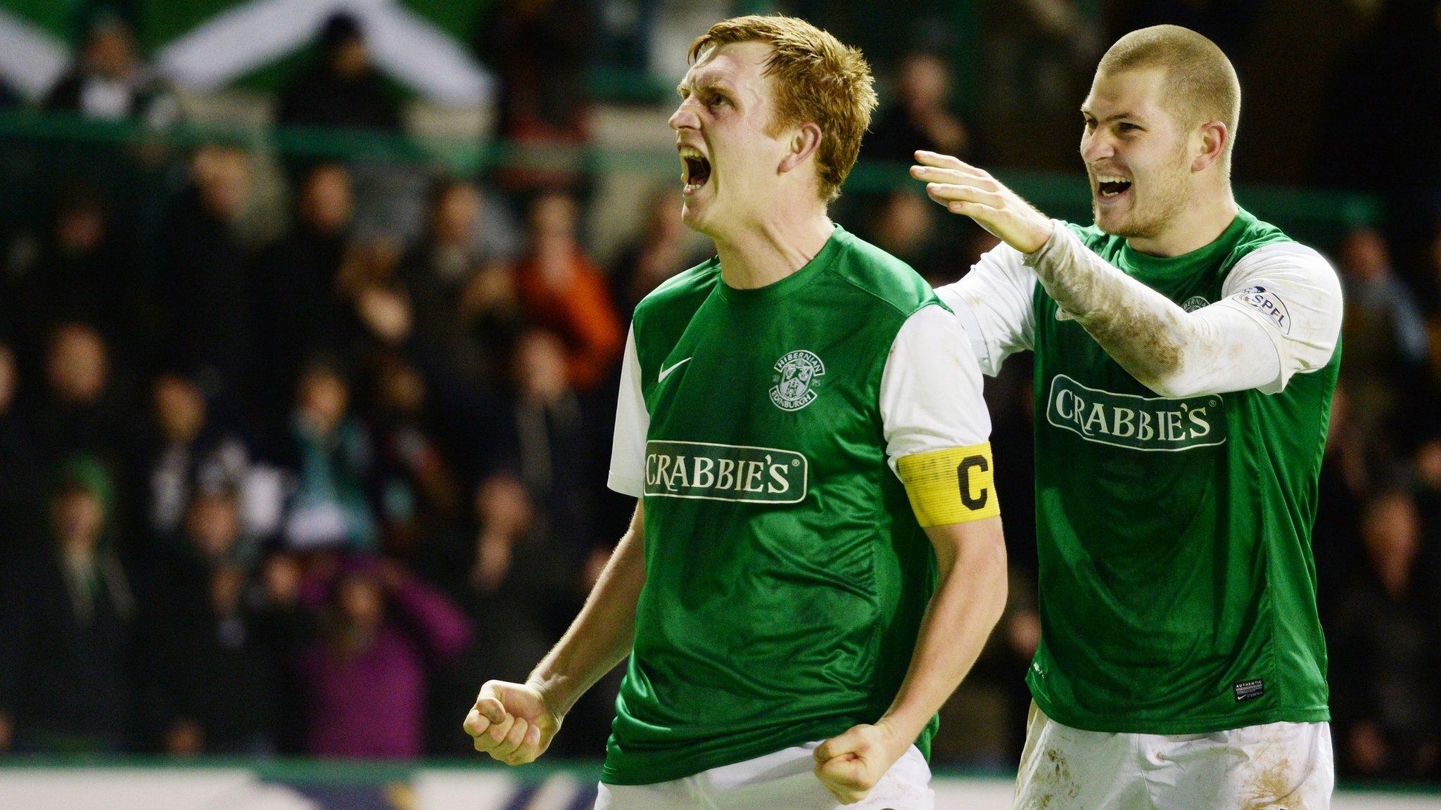 Liam Craig and James Collins celebrates Hibernian's winner against Hearts