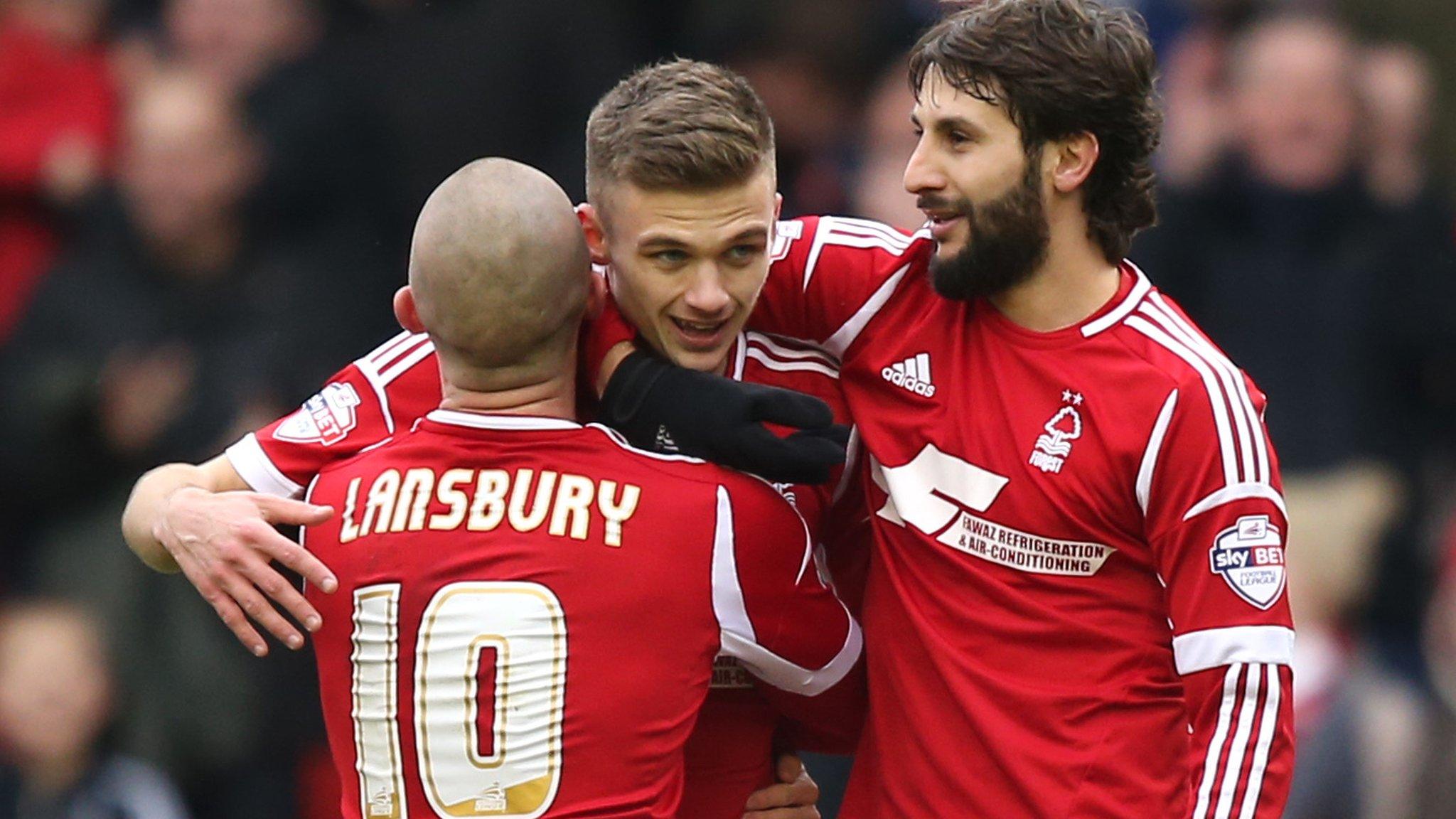 Nottingham Forest forward Jamie Paterson (centre) celebrates on the way to scoring a hat-trick against West Ham