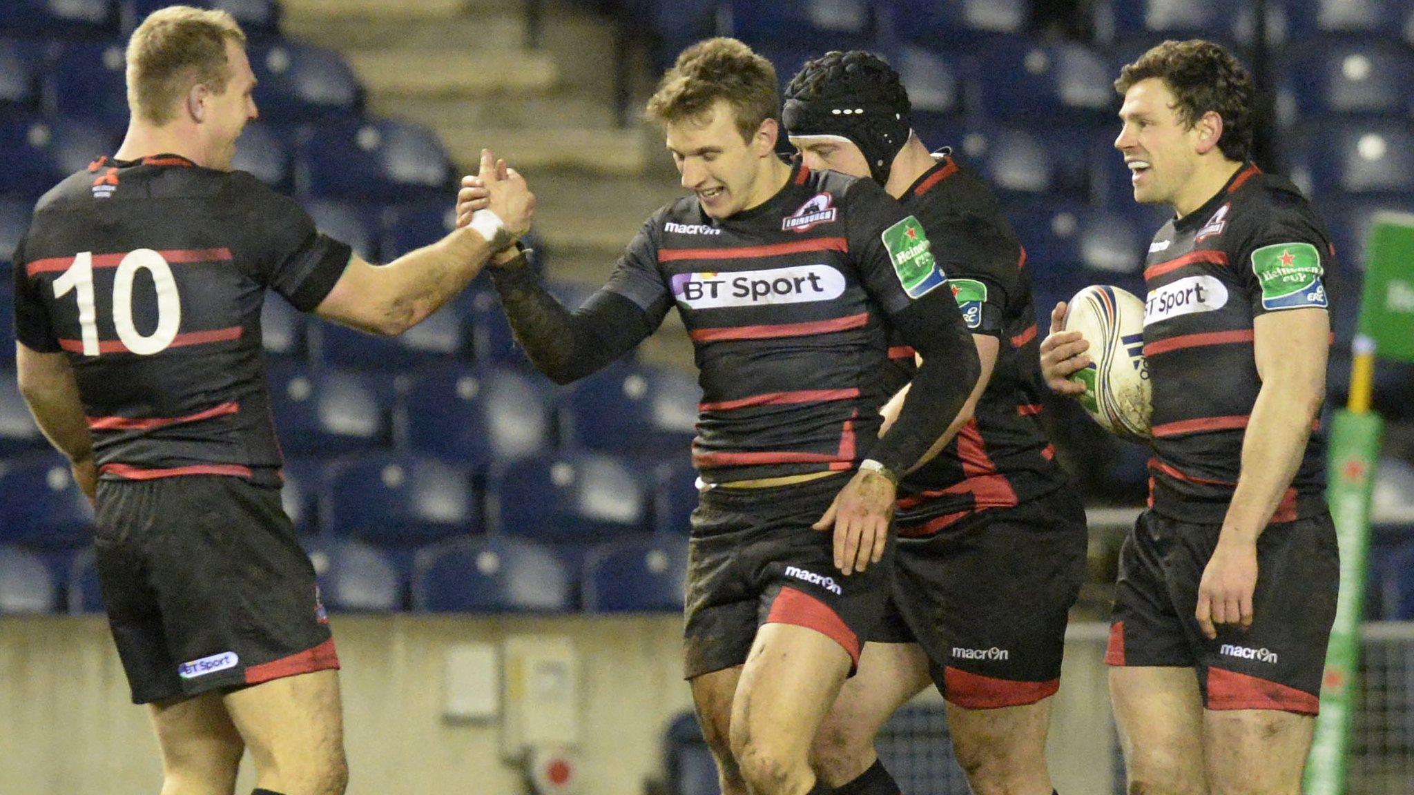 Tom Brown is congratulated for his first-half try