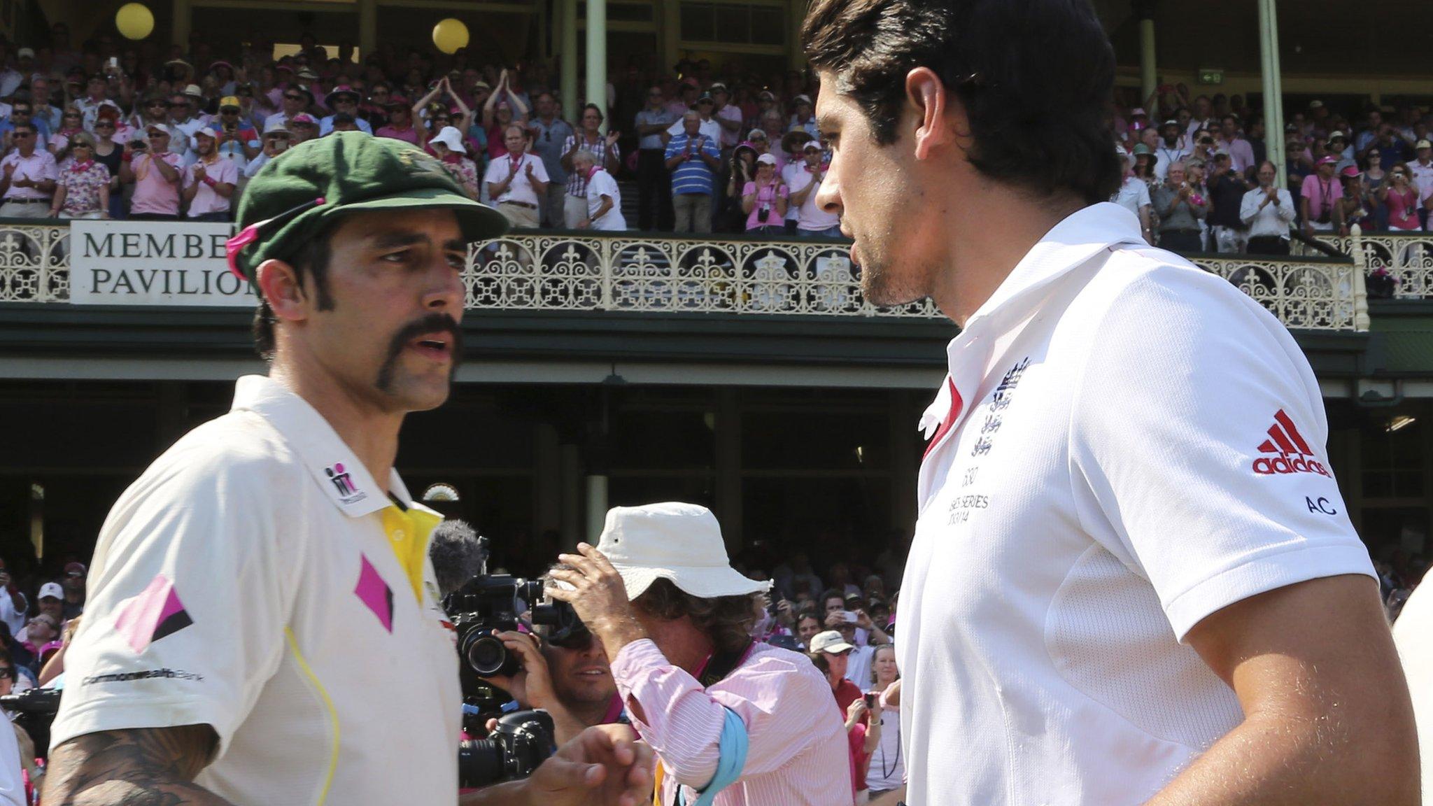 England captain Alastair Cook (left)and Australia bowler Mitchell Johnson during the Ashes