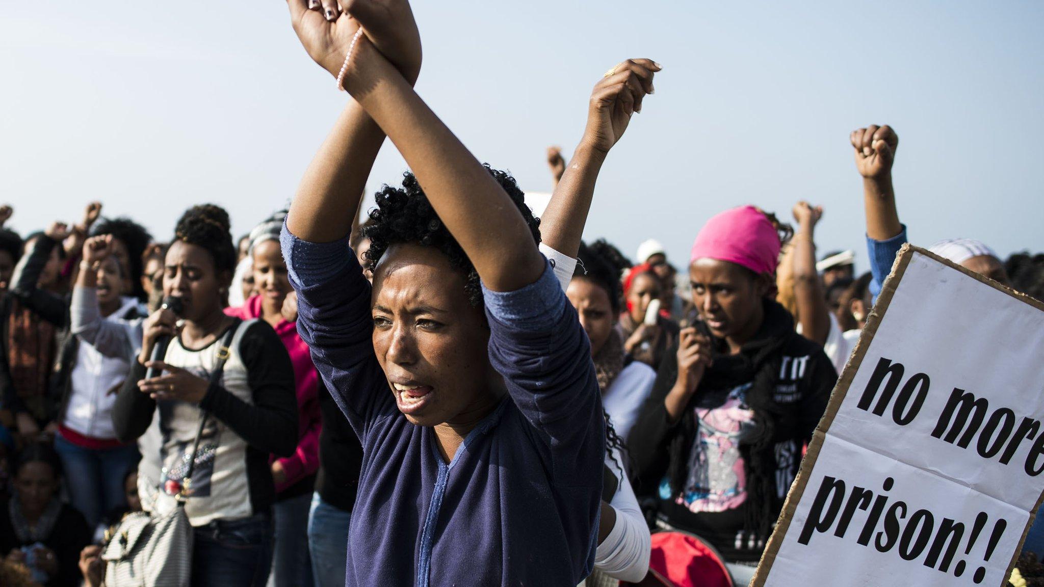 Female African asylum seekers and their children demonstrate on January 15, 2014 in Tel Aviv, Israel.