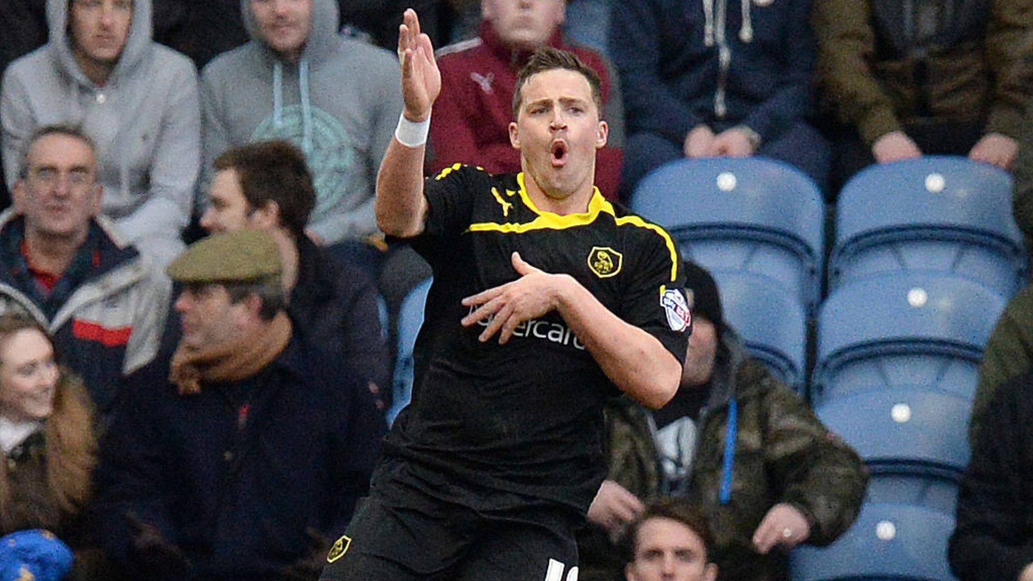 Sheffield Wednesday's Chris Maguire celebrates his equaliser at Burnley