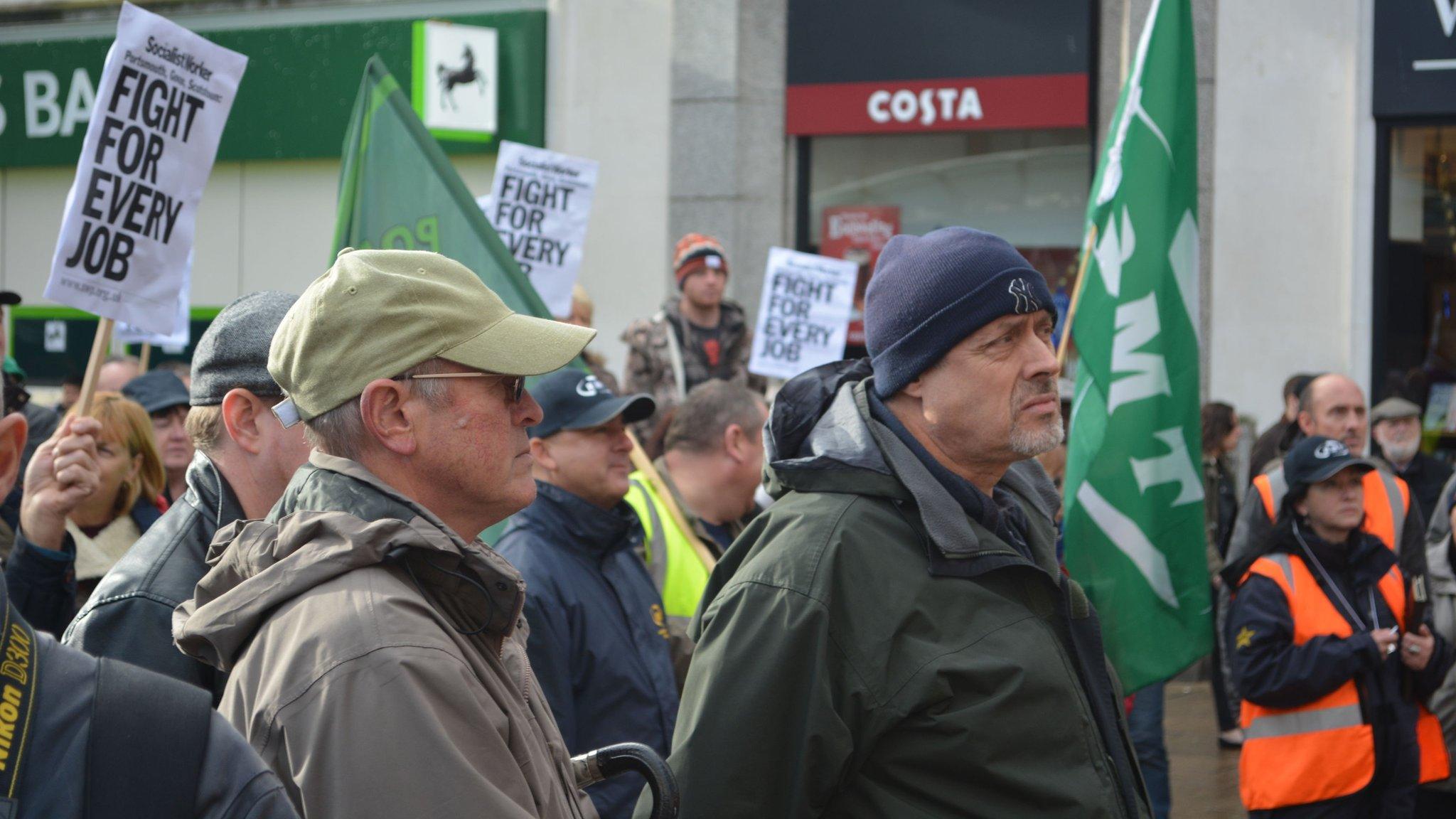 People attend at a rally in Portsmouth city centre supporting the 940 BAE workers who are to lose their job at the city"s shipyard.