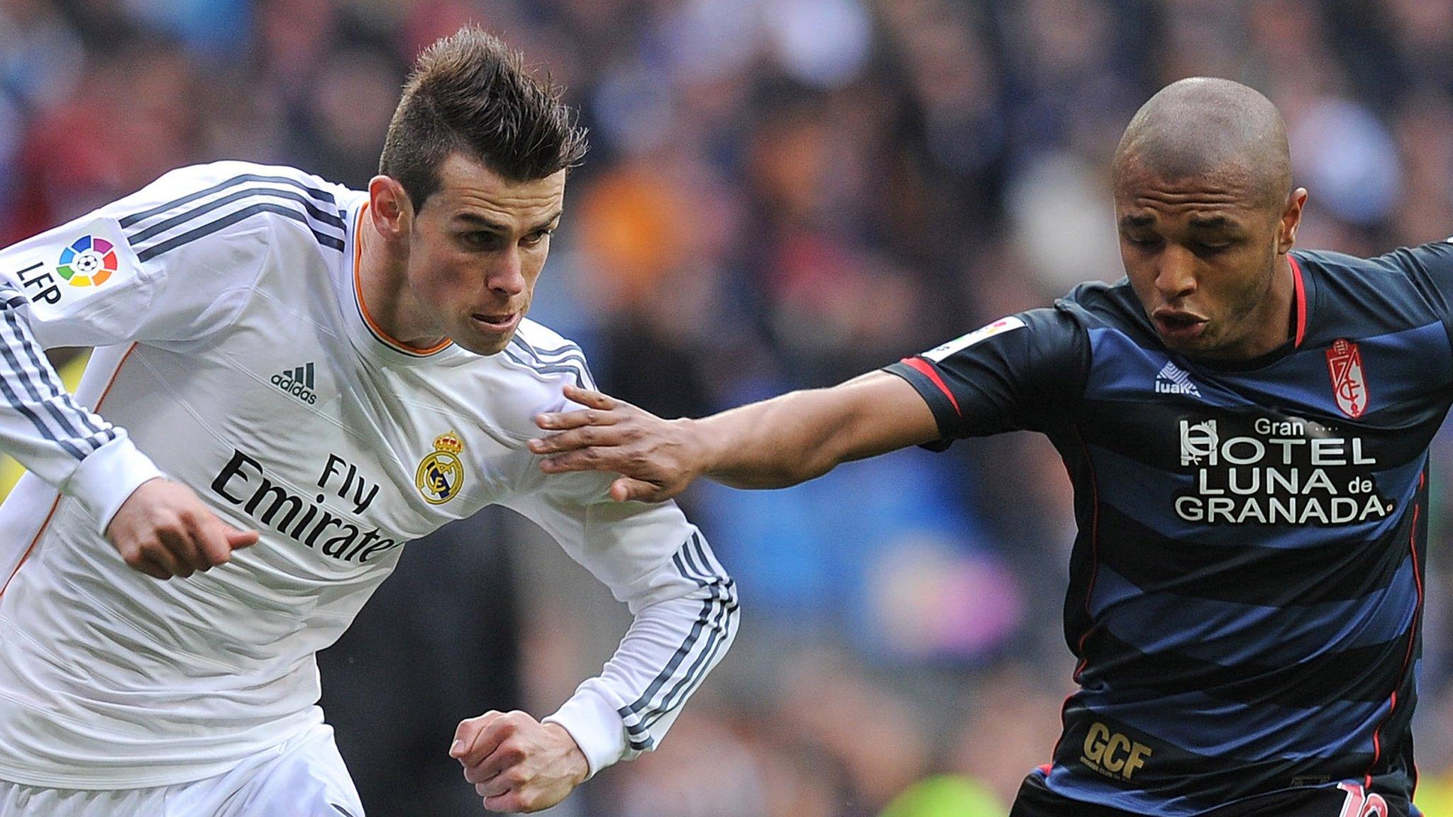 Gareth Bale had to be substituted at half time for Real Madrid, who won 2-0 to go top of La Liga.