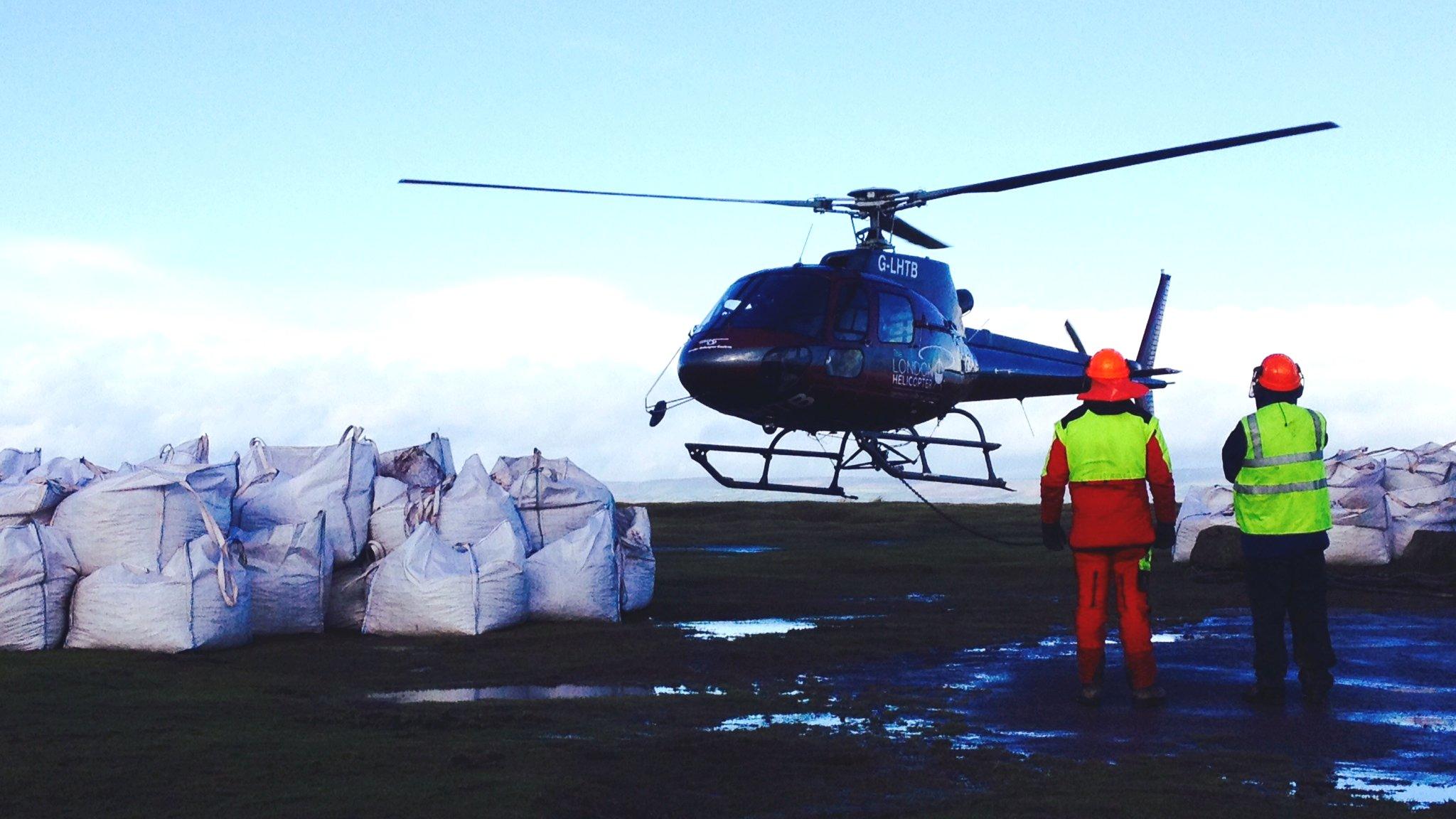 Helicopter flying stones to Offa's Dyke