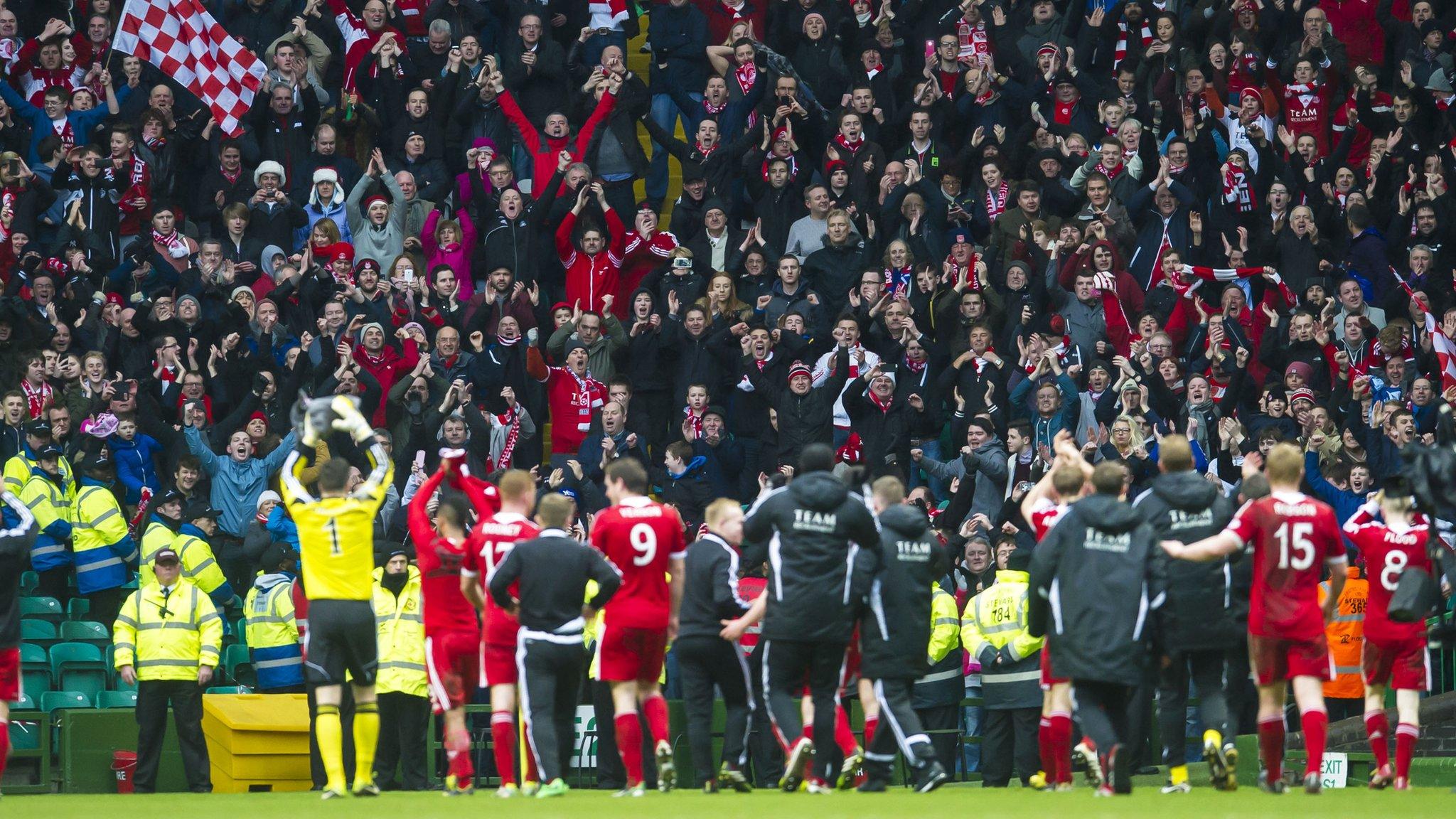 Aberdeen fans celebrate their Scottish Cup semi-final win at Celtic Park