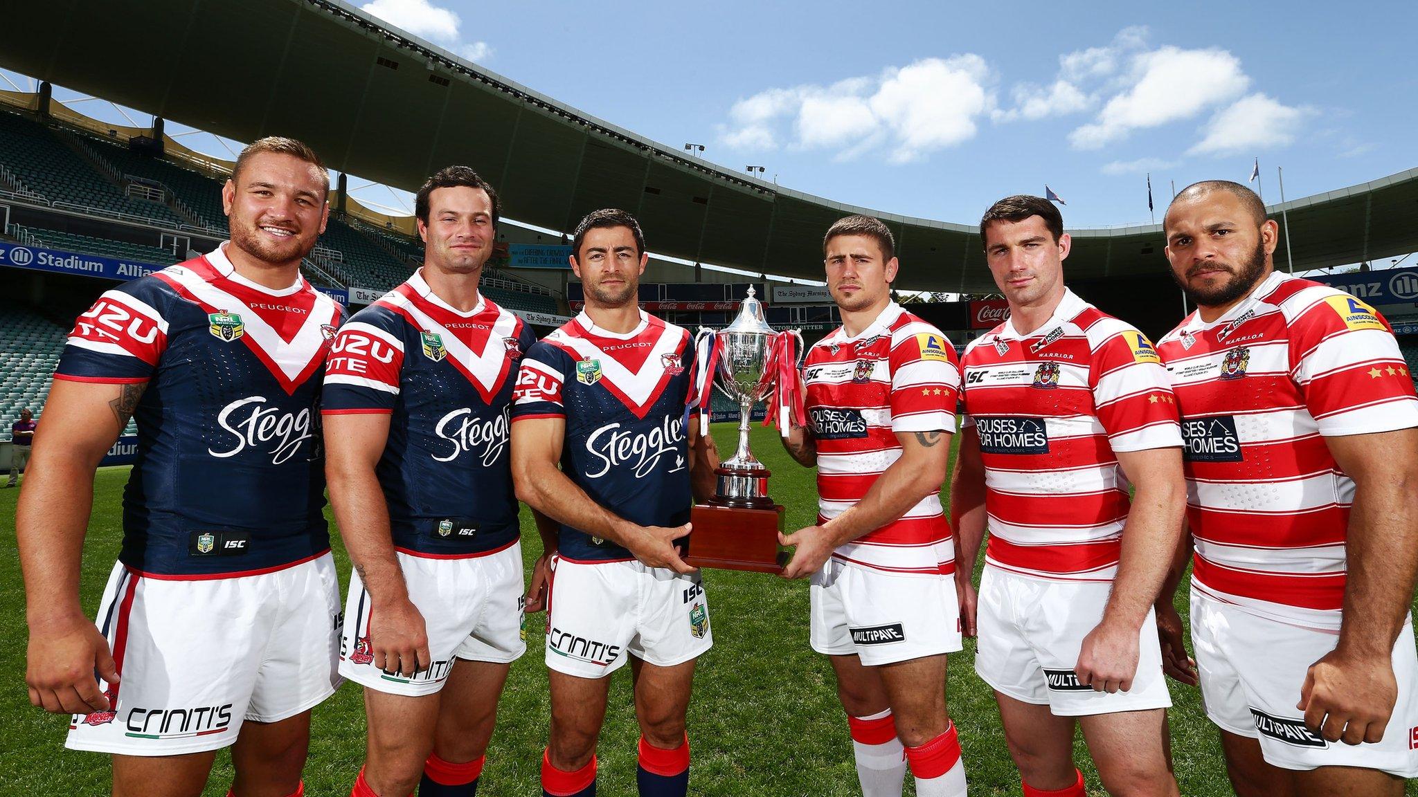 Sydney Roosters and Wigan Warriors players line up