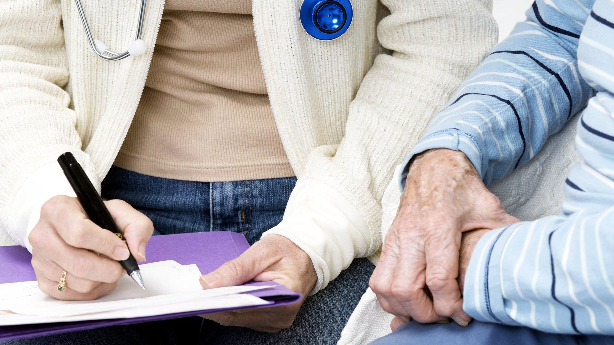 Doctor and elderly patient