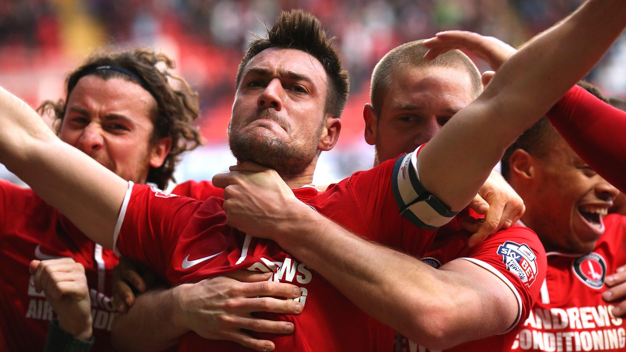 Charlton captain Johnnie Jackson (second left) celebrates his winner against QPR