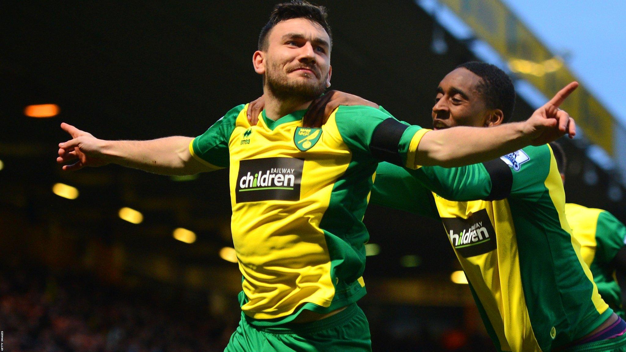 Robert Snodgrass celebrates giving Norwich the lead over Tottenham