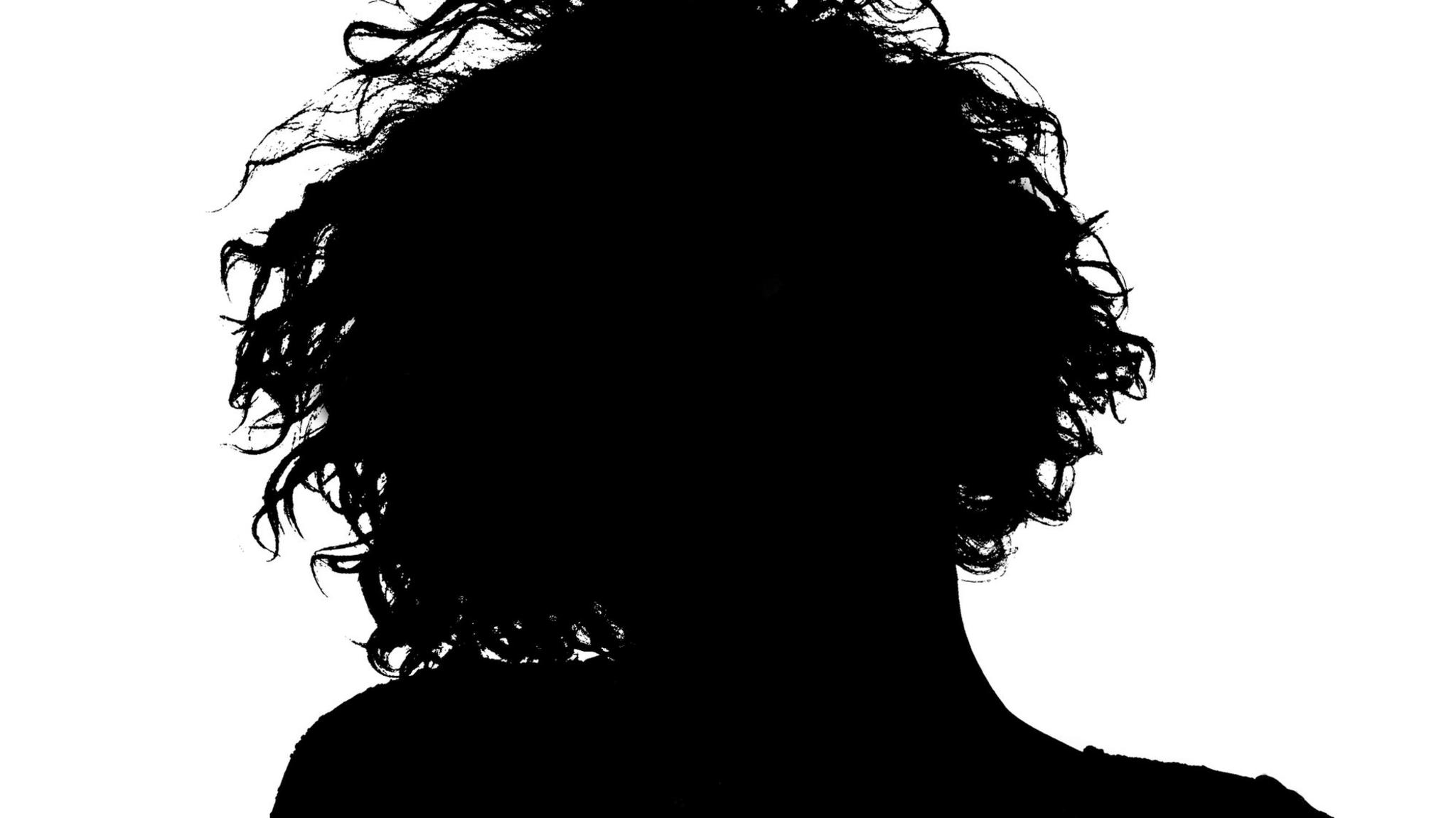 Silhouette of the back of a woman's head