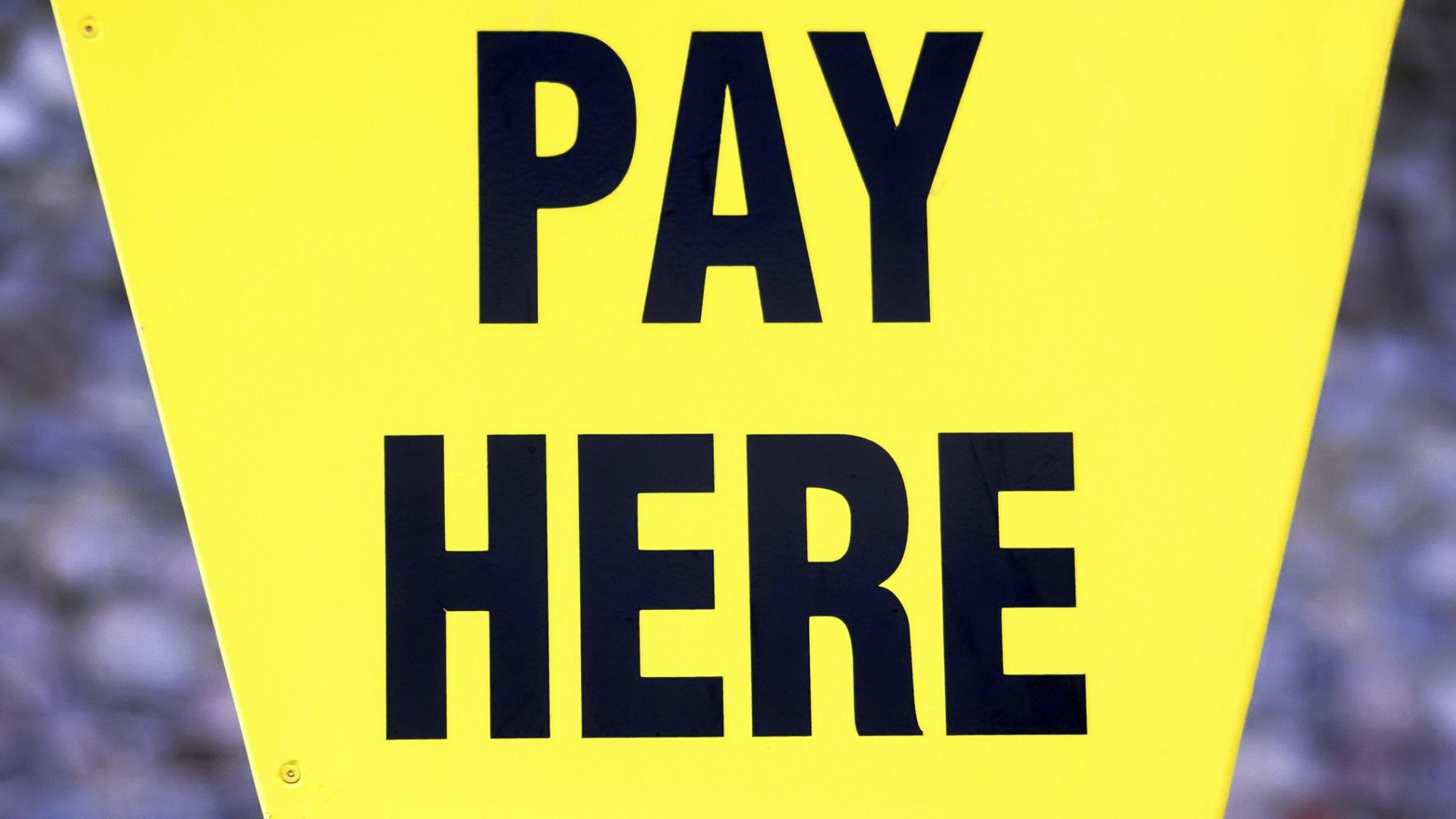 Pay Here sign