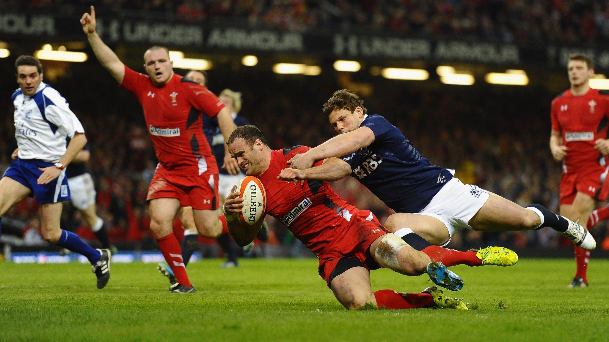 Jamie Roberts scores a try for Wales against Scotland in their 2014 Six Nations match Cardiff