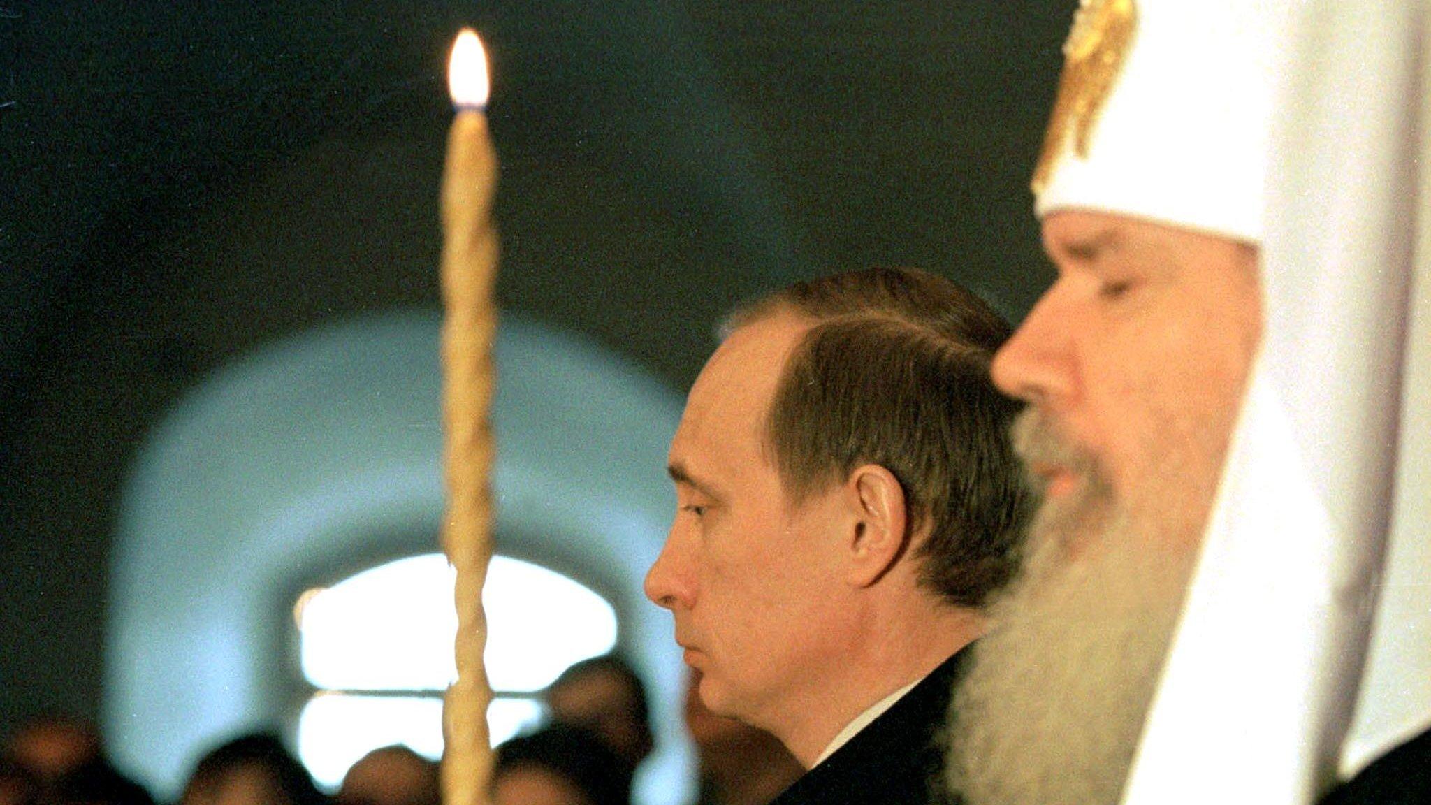 Putin with Orthodox priest