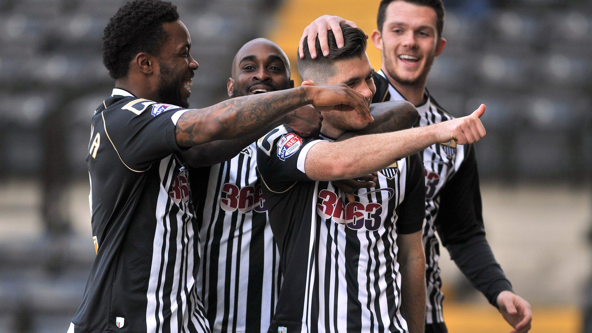 Ronan Murray celebrates with Notts County teammates