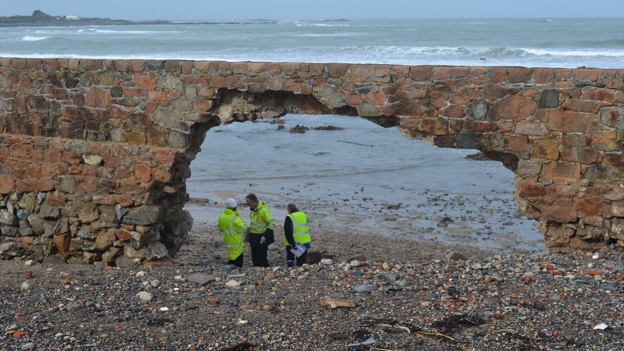 Arch created in the Vazon sea wall by winter storms