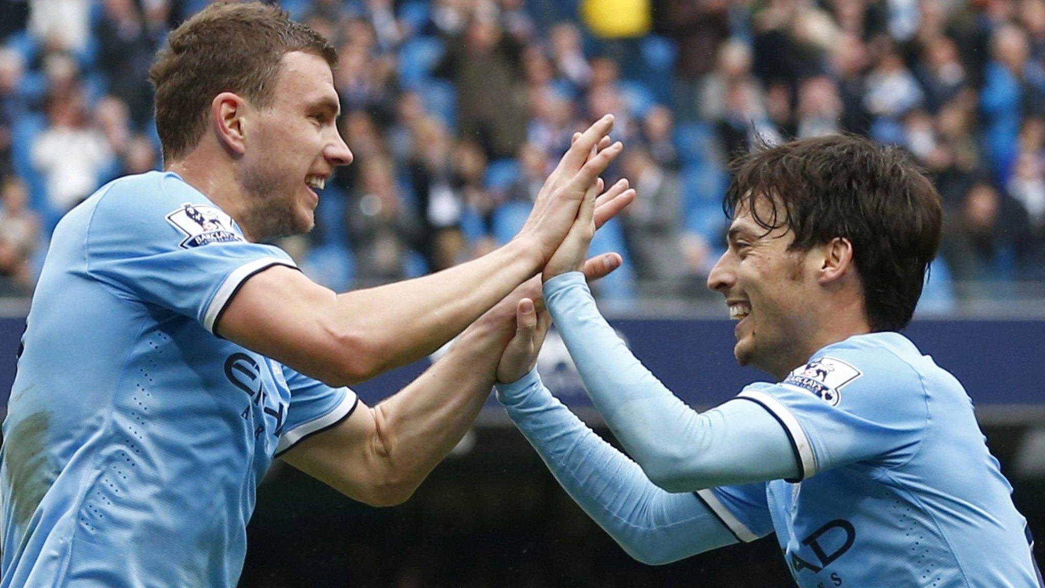 Manchester City striker Edin Dzeko (left) and playmaker David Silva