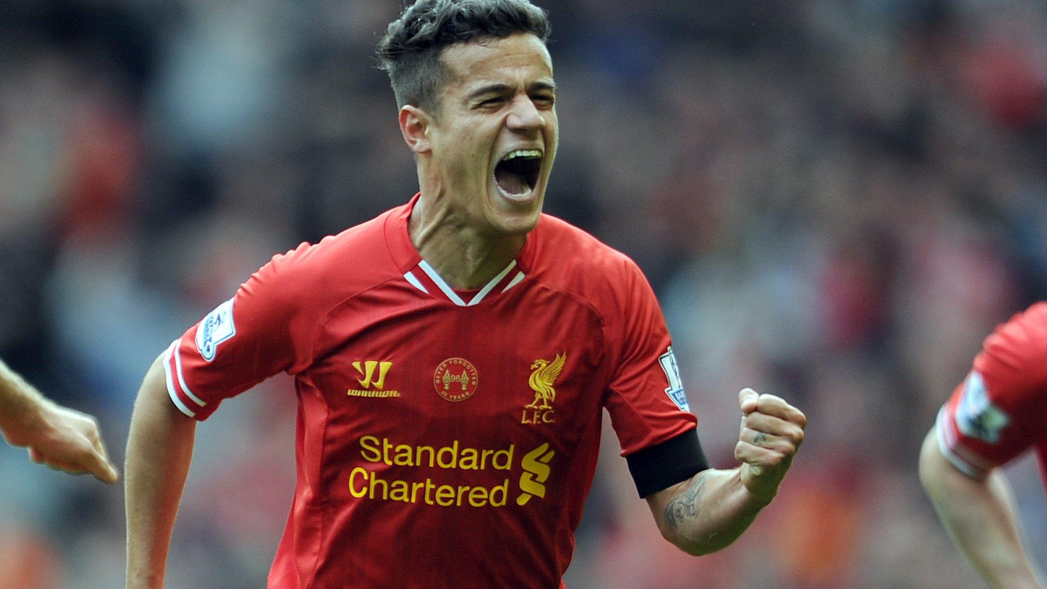 Liverpool playmaker Philippe Coutinho celebrates his winner against Manchester City