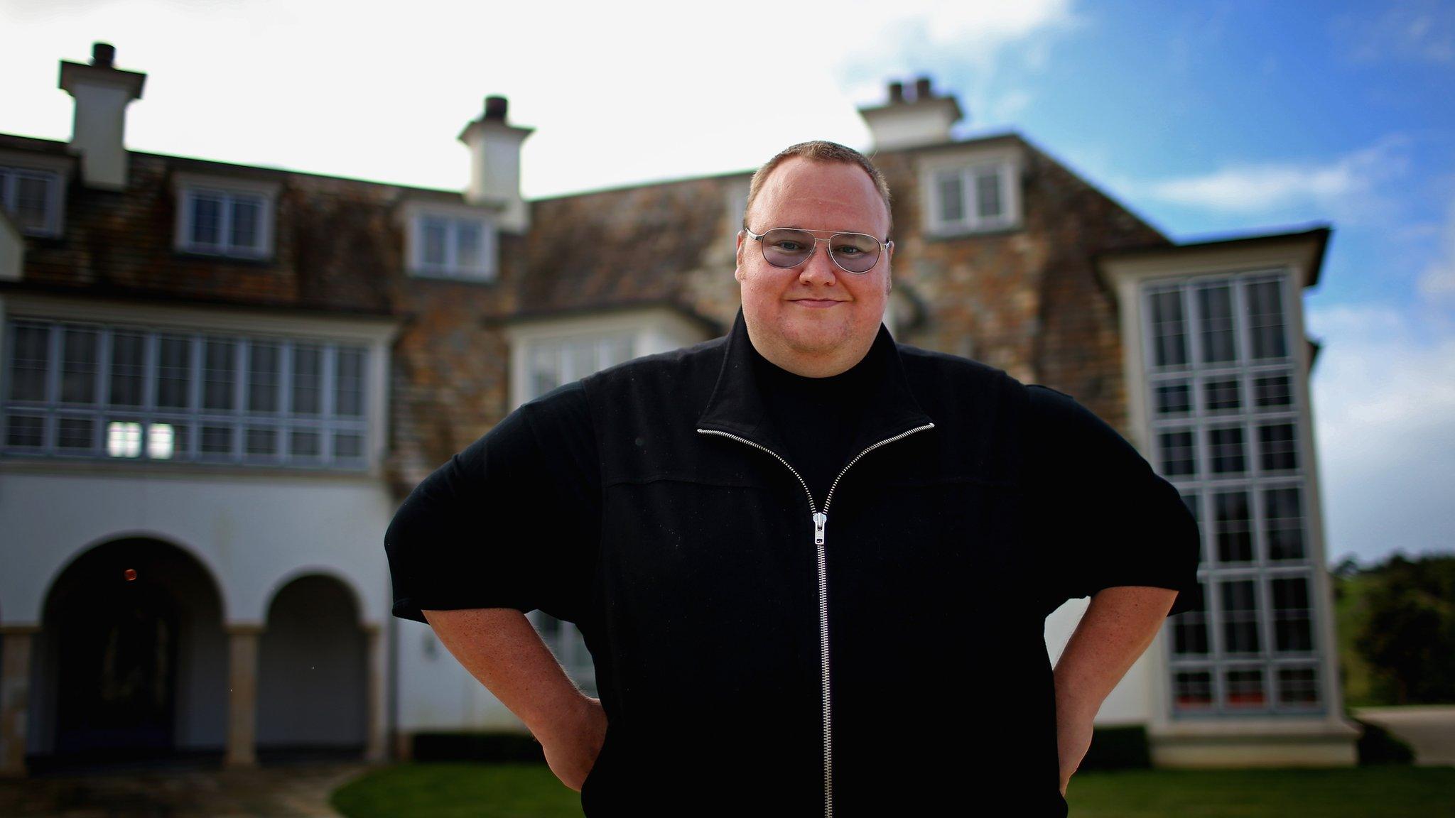 Kim Dotcom outside his home