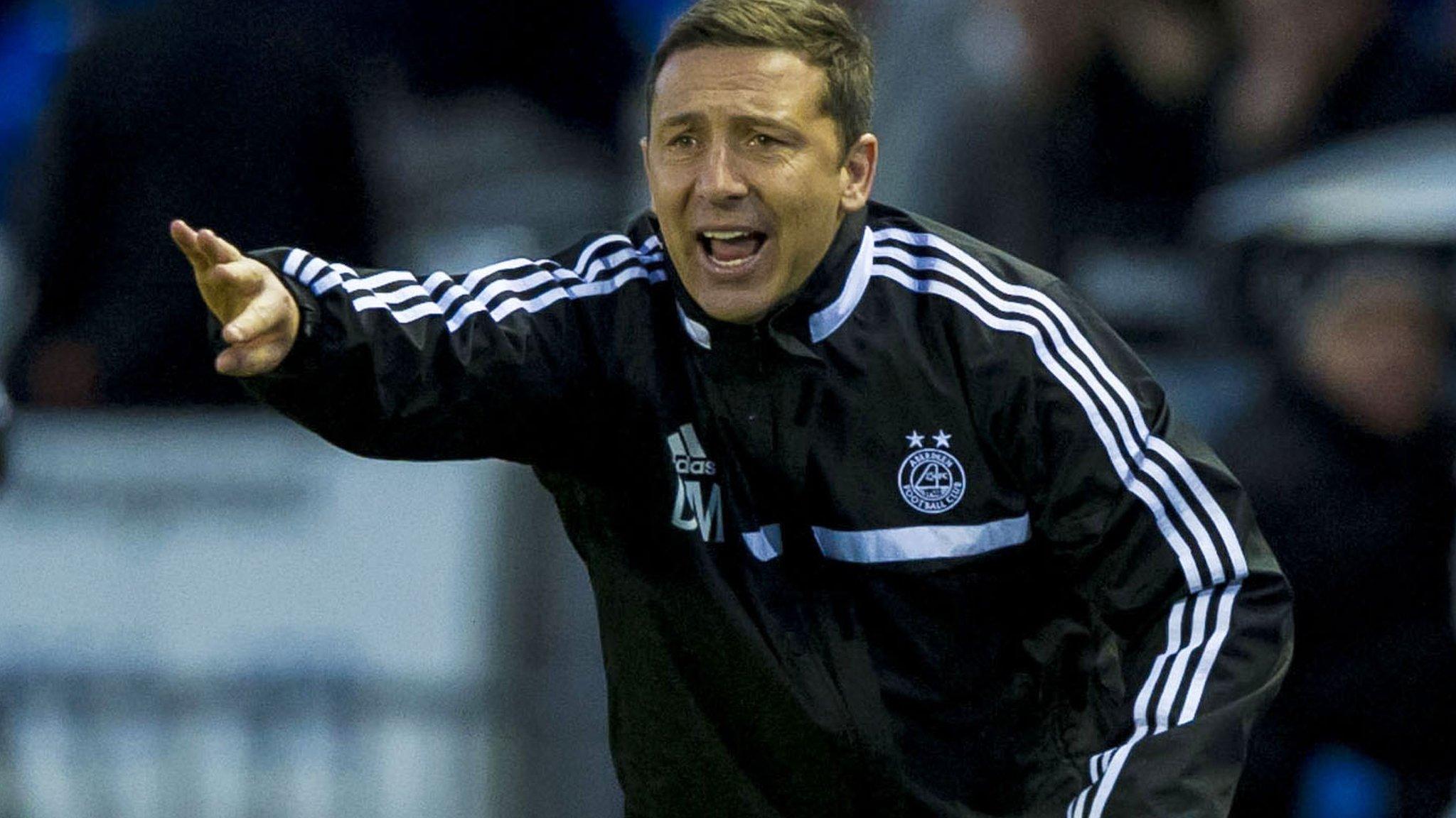 Derek McInnes directs his players