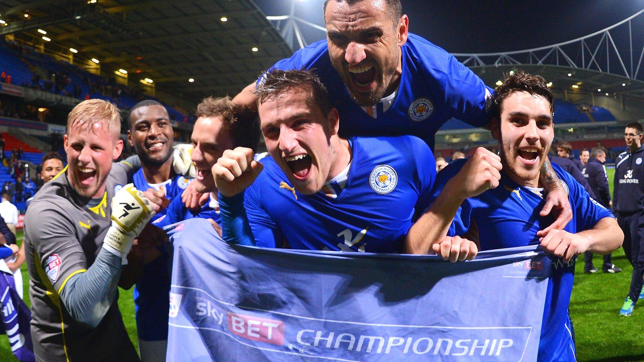 Kasper Schmeichel (L) Marcin Wasilewski (top), Chris Wood and Matty James (R) celebrate winning the Championship title.