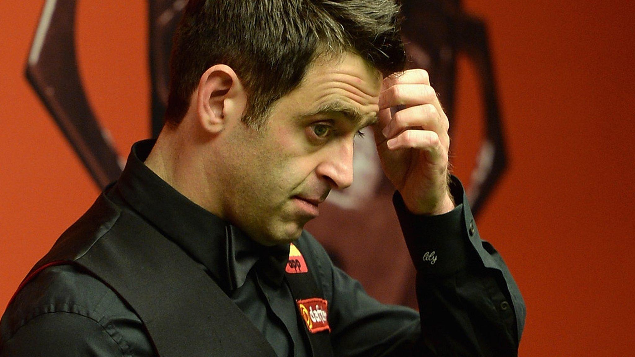 Ronnie O'Sullivan in action against Joe Perry