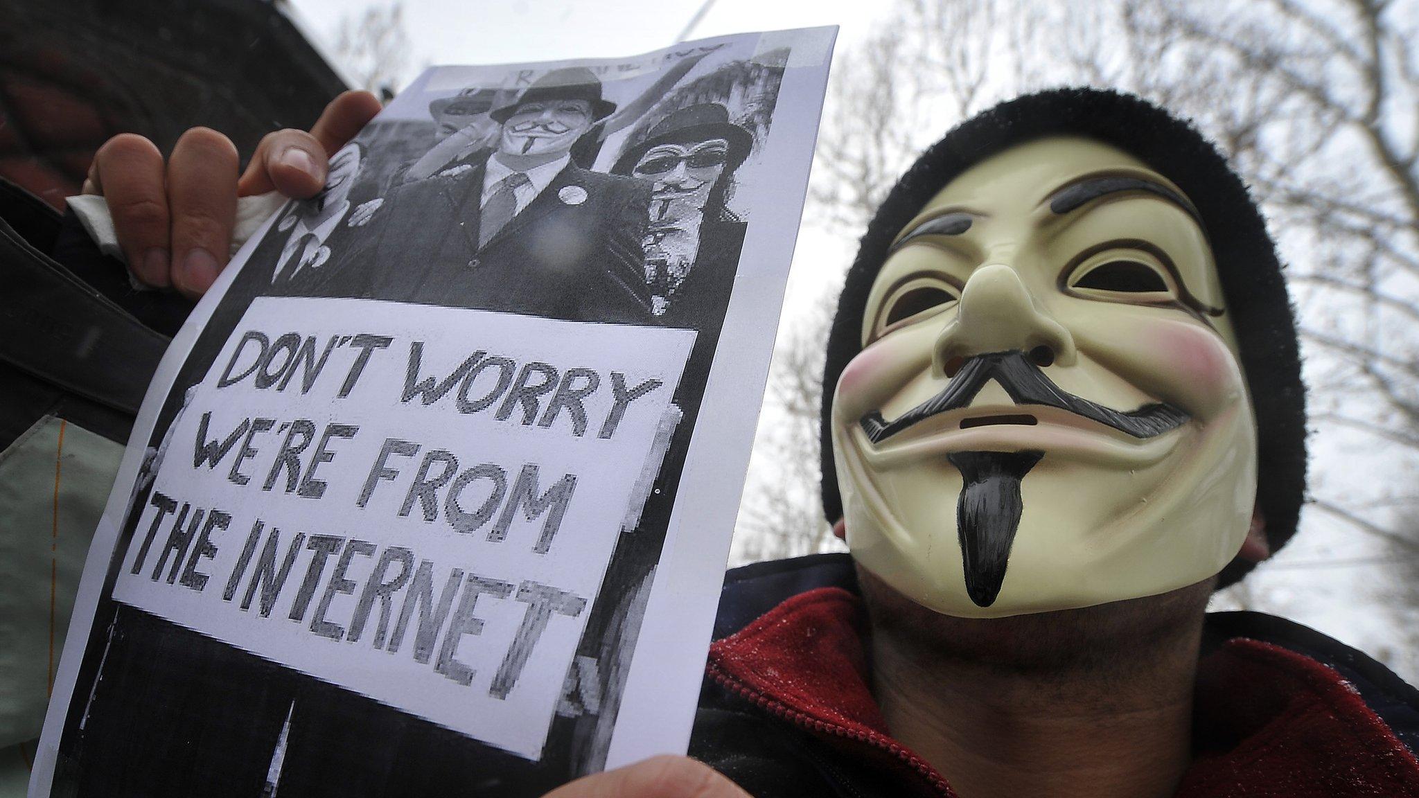 A protester wearing an Anonymous Guy Fawkes mask takes part in a demonstration in Zagreb, Croatia, on 11 February 2012