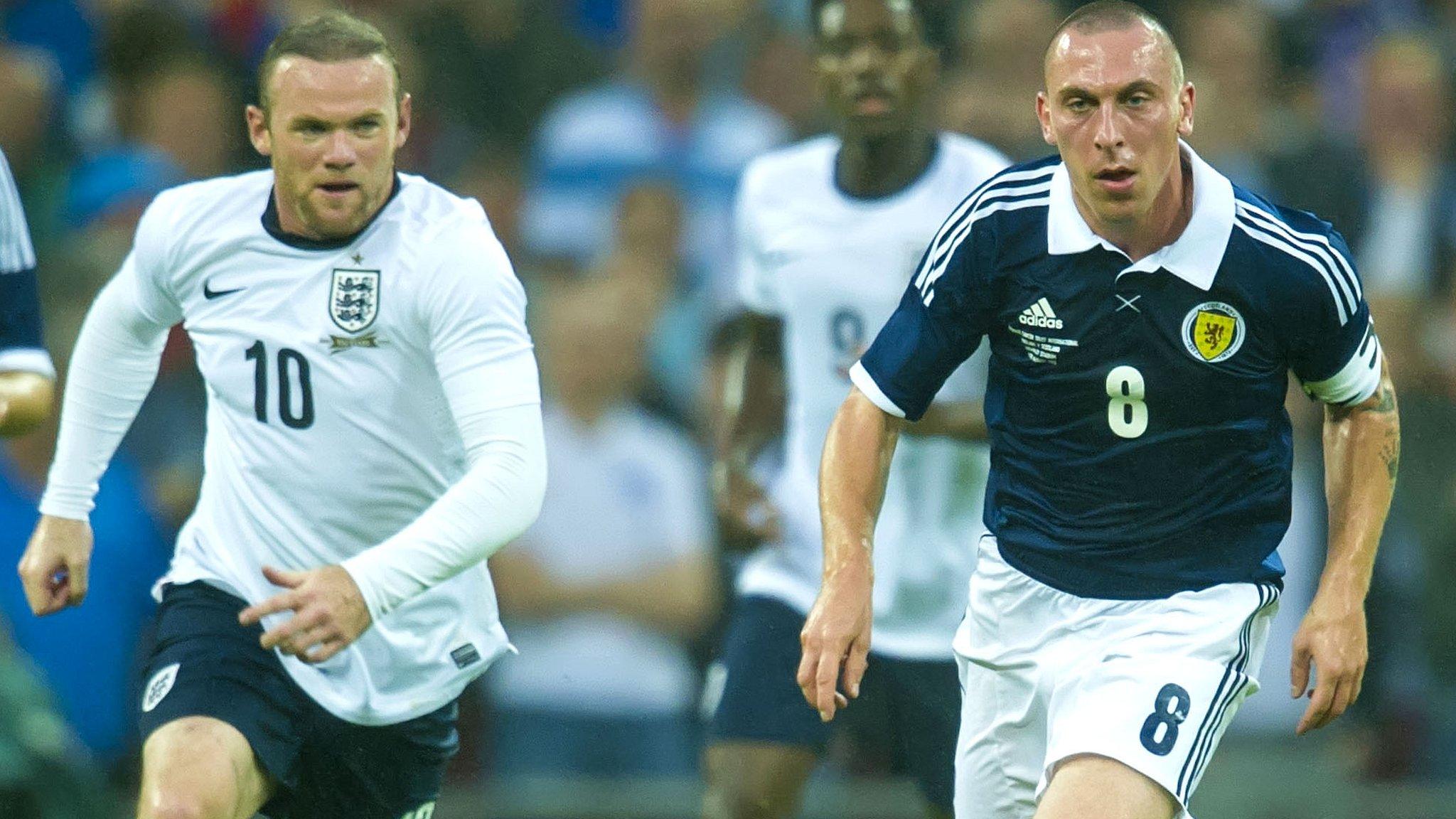 Wayne Rooney and Scott Brown