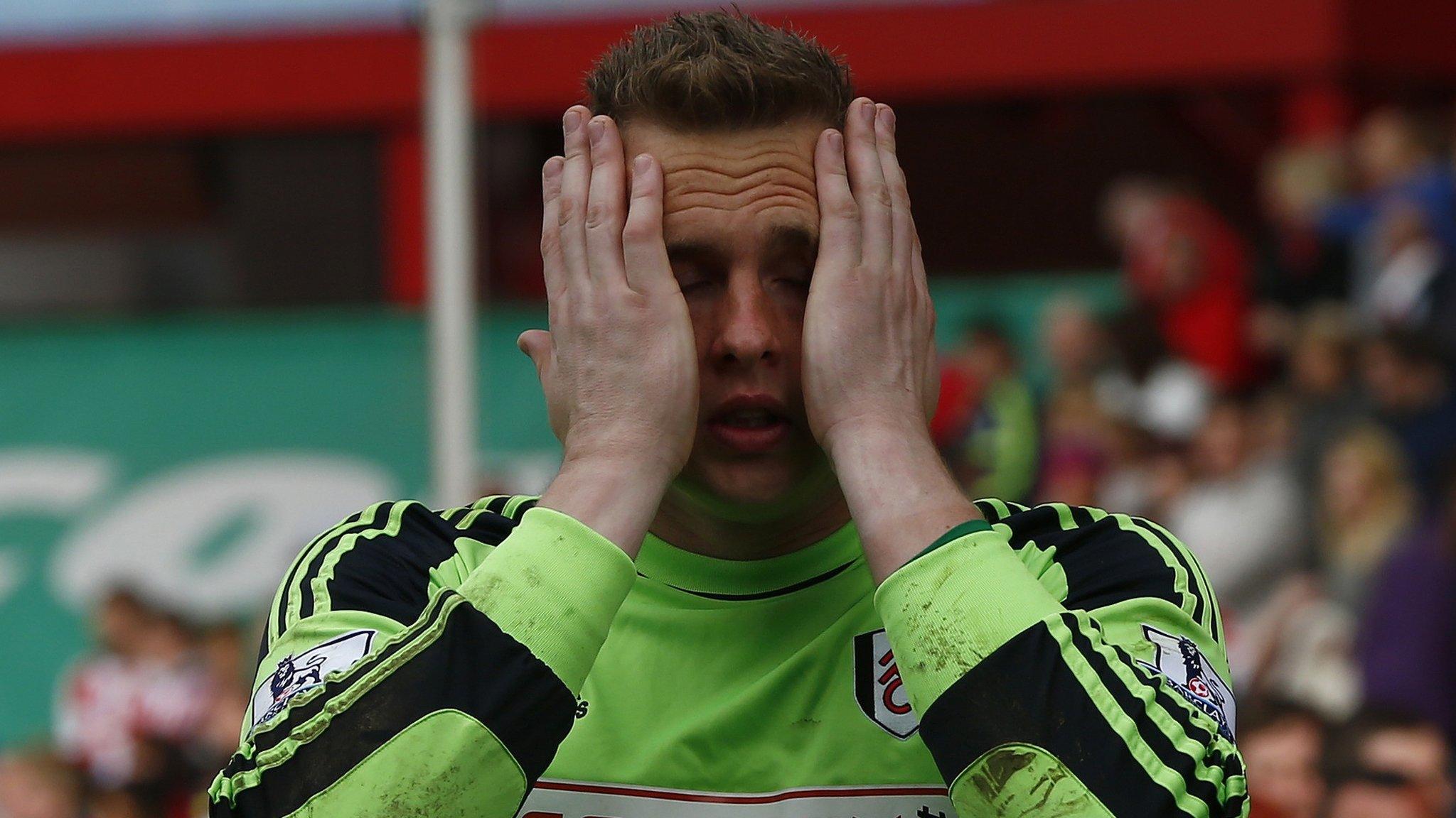 Dejected Fulham keeper David Stockdale